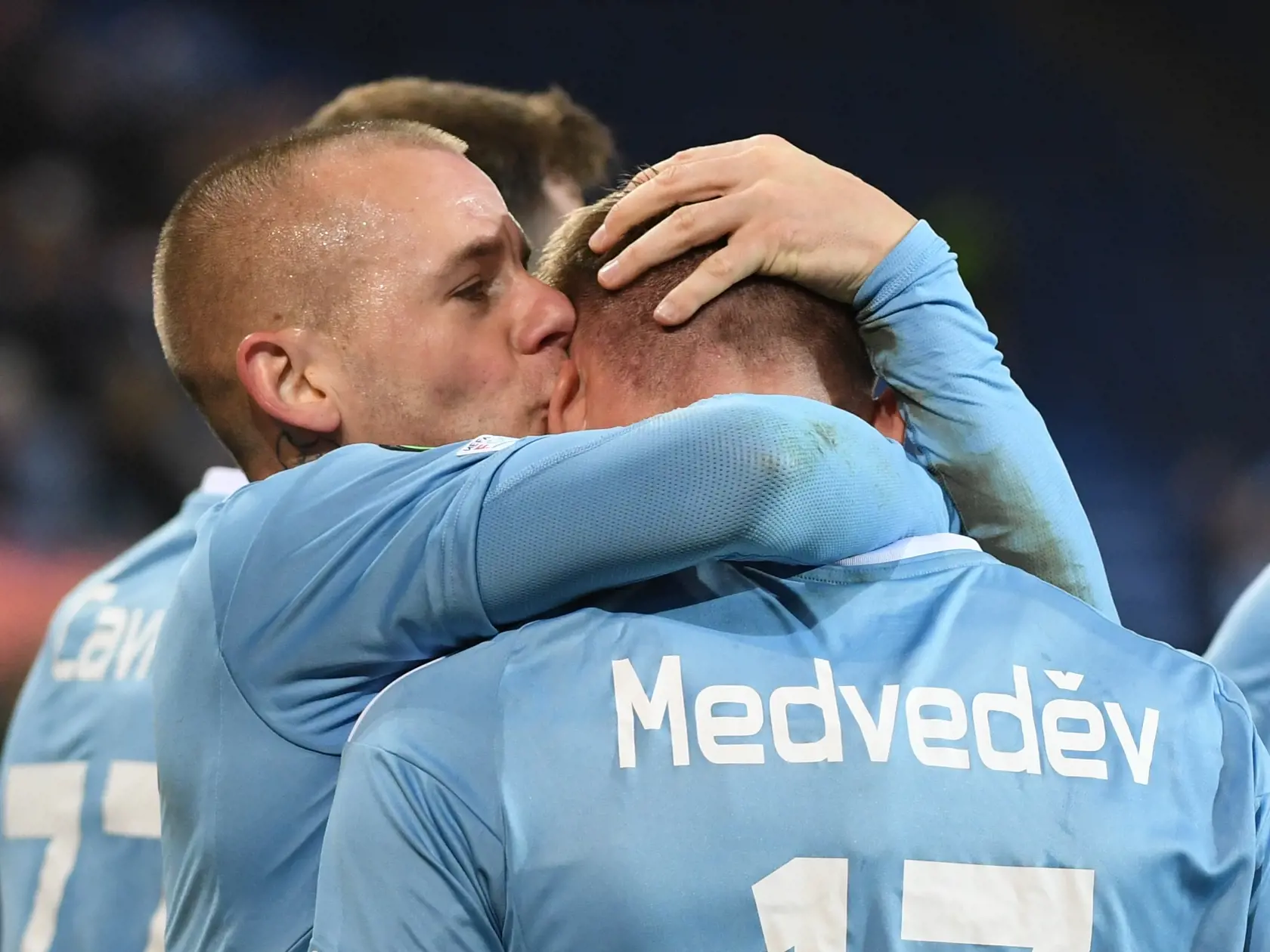 Na snímke zľava Vladimír Weiss ml. a autor gólu Jurij Medveděv (Slovan) sa tešia z gólu počas prvého zápasu osemfinále Európskej konferenčnej ligy FC Bazilej - ŠK Slovan Bratislava 9. marca 2023 v Bazileji. FOTO TASR - Martin Baumann