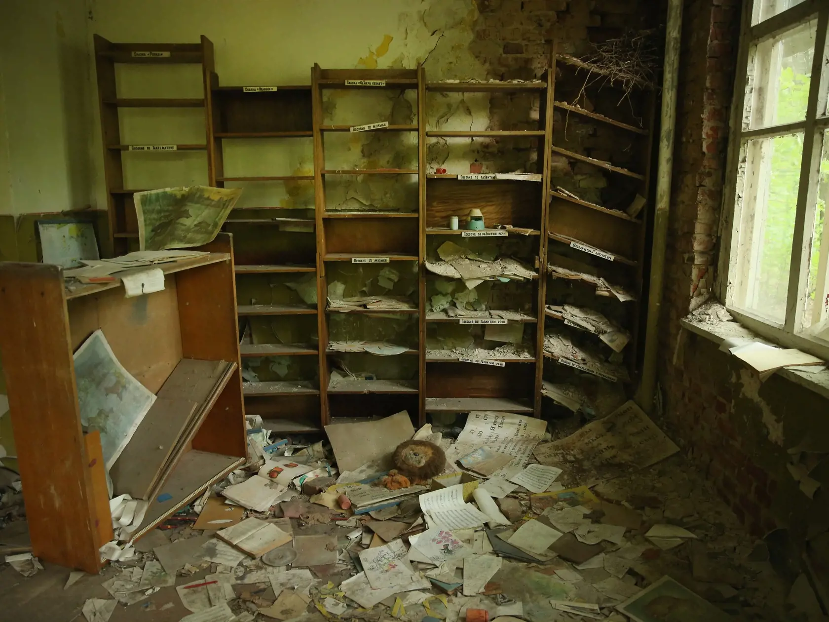 CHORNOBYL, UKRAINE - SEPTEMBER 29:  Books and music notes lie strewn on the floor in the abandoned kindergarten of Kopachi village located inside the Chernobyl Exclusion Zone on September 29, 2015 near Chornobyl, Ukraine. Kopachi, a village that before 1986 had a population of 1,114, lies only a few kilometers south of the former Chernobyl nuclear power plant, where in 1986 workers inadvertantly caused reactor number four to explode, creating the worst nuclear accident in history. Radiation fall
