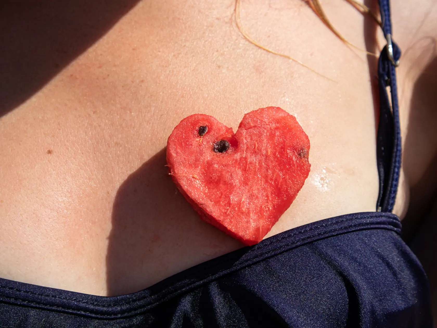 A,Heart,Of,A,Watermelon,On,A,Woman's,Chest,Summer