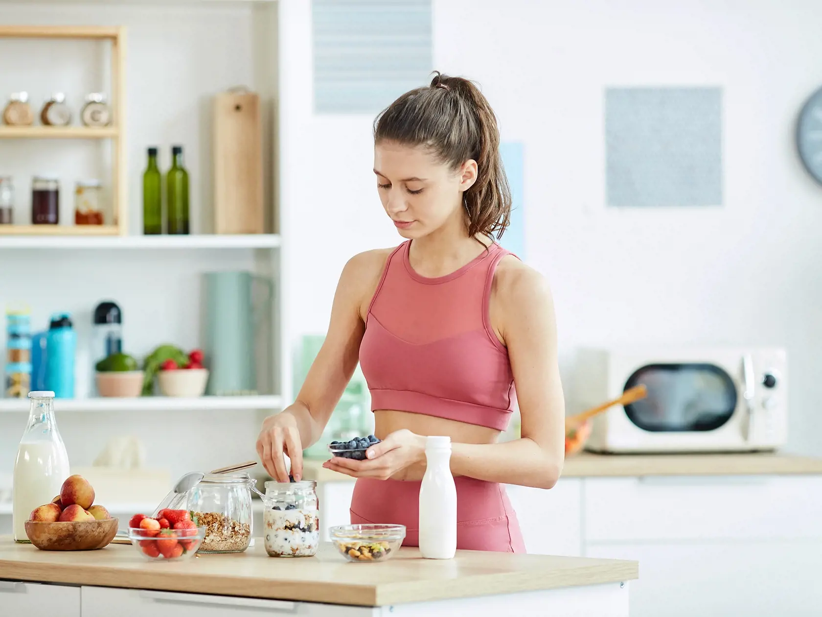 Waist,Up,Portrait,Of,Fit,Young,Woman,Making,Healthy,Granola