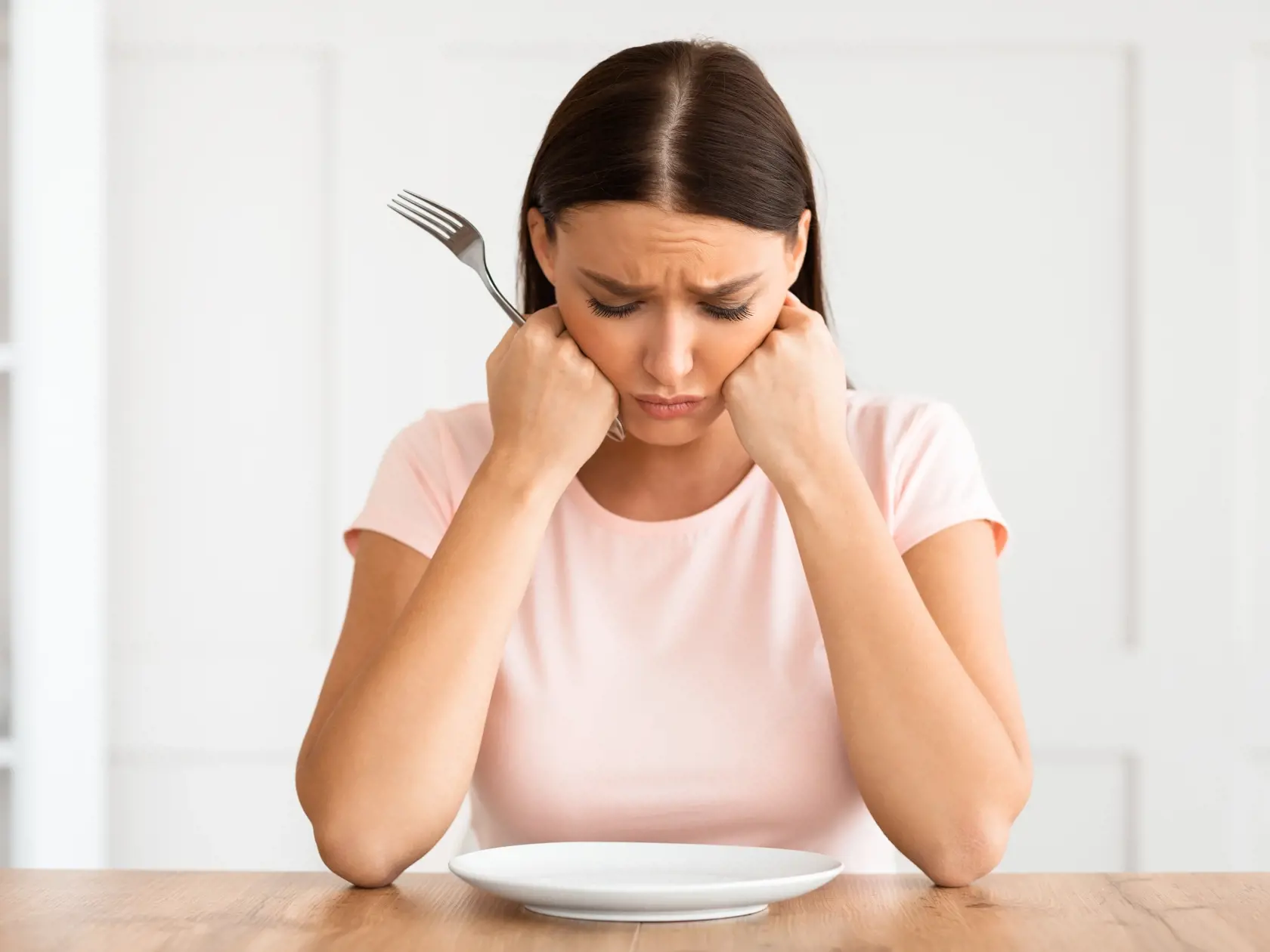 Dieting,Concept.,Unhappy,Woman,Looking,At,Empty,Plate,Losing,Weight