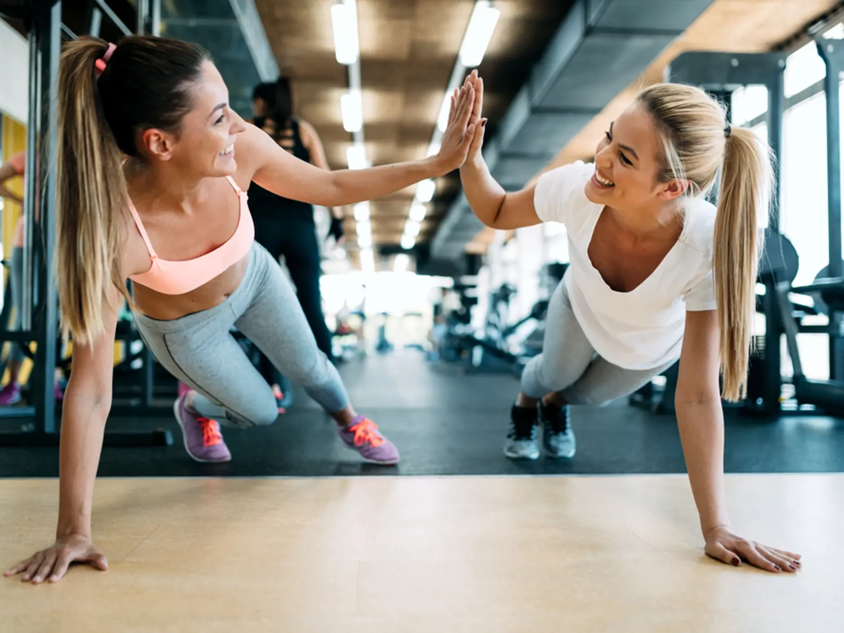 Two,Attractive,Fitness,Girls,Doing,Push,Ups