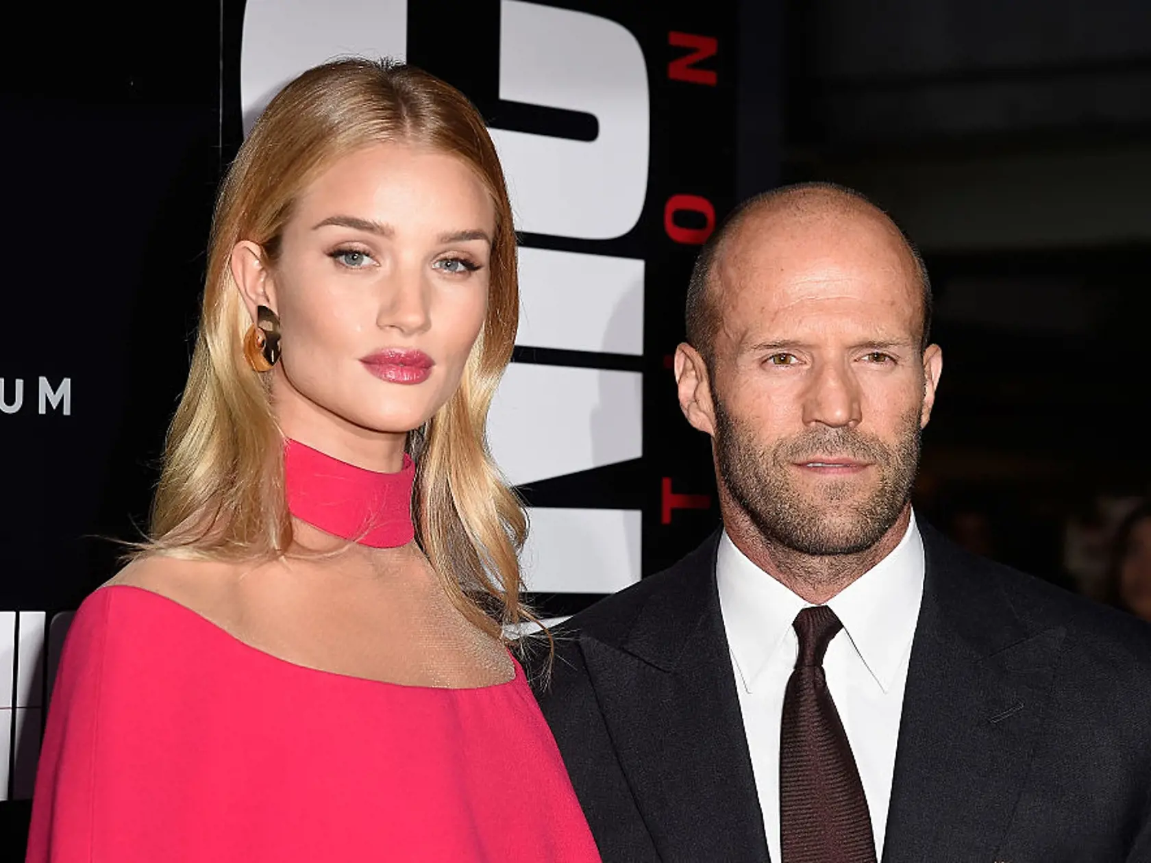 HOLLYWOOD, CA - AUGUST 22:  Actors Rosie Huntington-Whiteley (L) and Jason Statham  arrives at the Premiere of Summit Entertainment's "Mechanic: Resurrection" at ArcLight Hollywood on August 22, 2016 in Hollywood, California.  (Photo by Frazer Harrison/Getty Images)