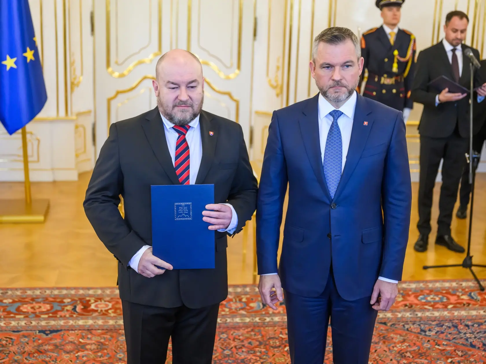 Na snímke vpravo prezident SR Peter Pellegrini počas vymenovania nového ministra cestovného ruchu a športu SR Rudolfa Huliaka (nominant Smer-SD) v Prezidentskom paláci v Bratislave 5. marca 2025. 