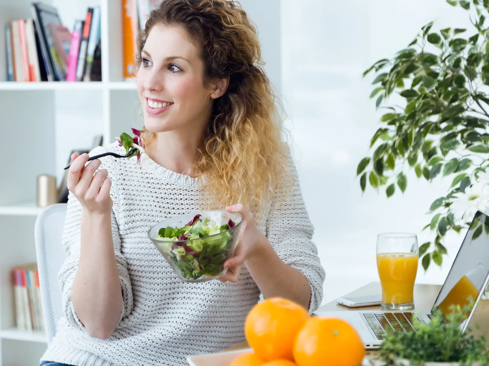 Portrait,Of,Beautiful,Young,Woman,Eating,Salad,At,Home.