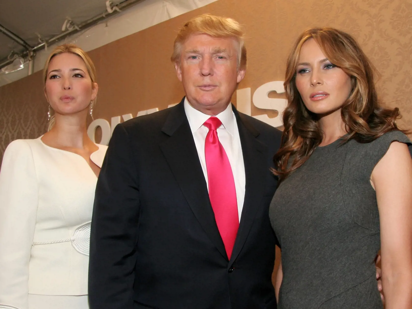 NEW YORK - SEPTEMBER 11: Ivanka Trump, Donald Trump and Melania Trump pose in the W VIP lounge during Olympus Fashion Week in Bryant Park September 11, 2006 in New York City. (Photo by Astrid Stawiarz/Getty Images for IMG) 