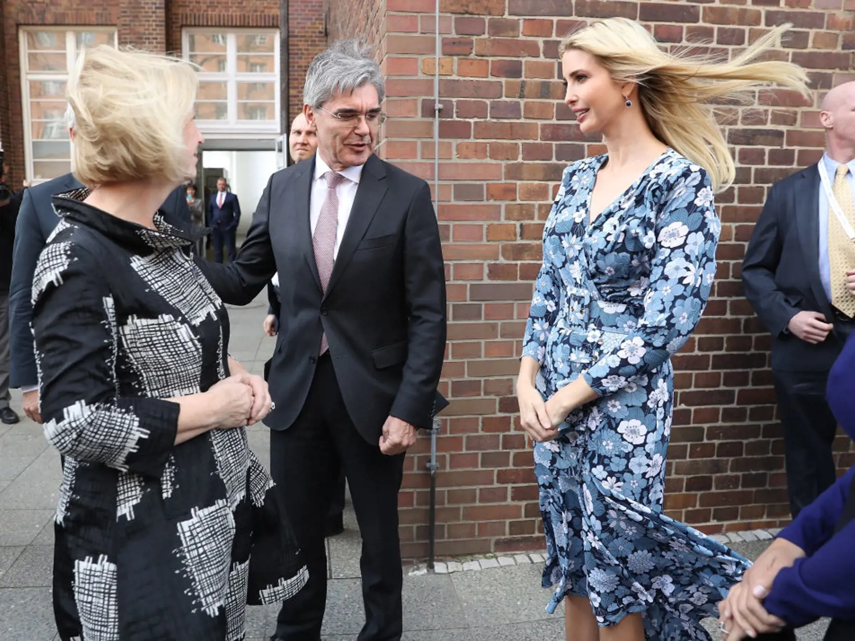 BERLIN, GERMANY - APRIL 25:  Ivanka Trump, daughter of U.S. President Donald Trump, (R) meets CEO Siemens Joe Kaeser (C) and German Minister for Education Johanna Wanka (L) at the Siemens mechantronic factory on April 25, 2017 in Berlin, Germany. Ivanka Trump attended the W20 conference on empowerment for women earlier in the day and is visiting the Siemens training center and the Holocaust memorial before attending an evening gala sponsored by Deutsche Bank. (Photo by Sean Gallup/Getty Images)