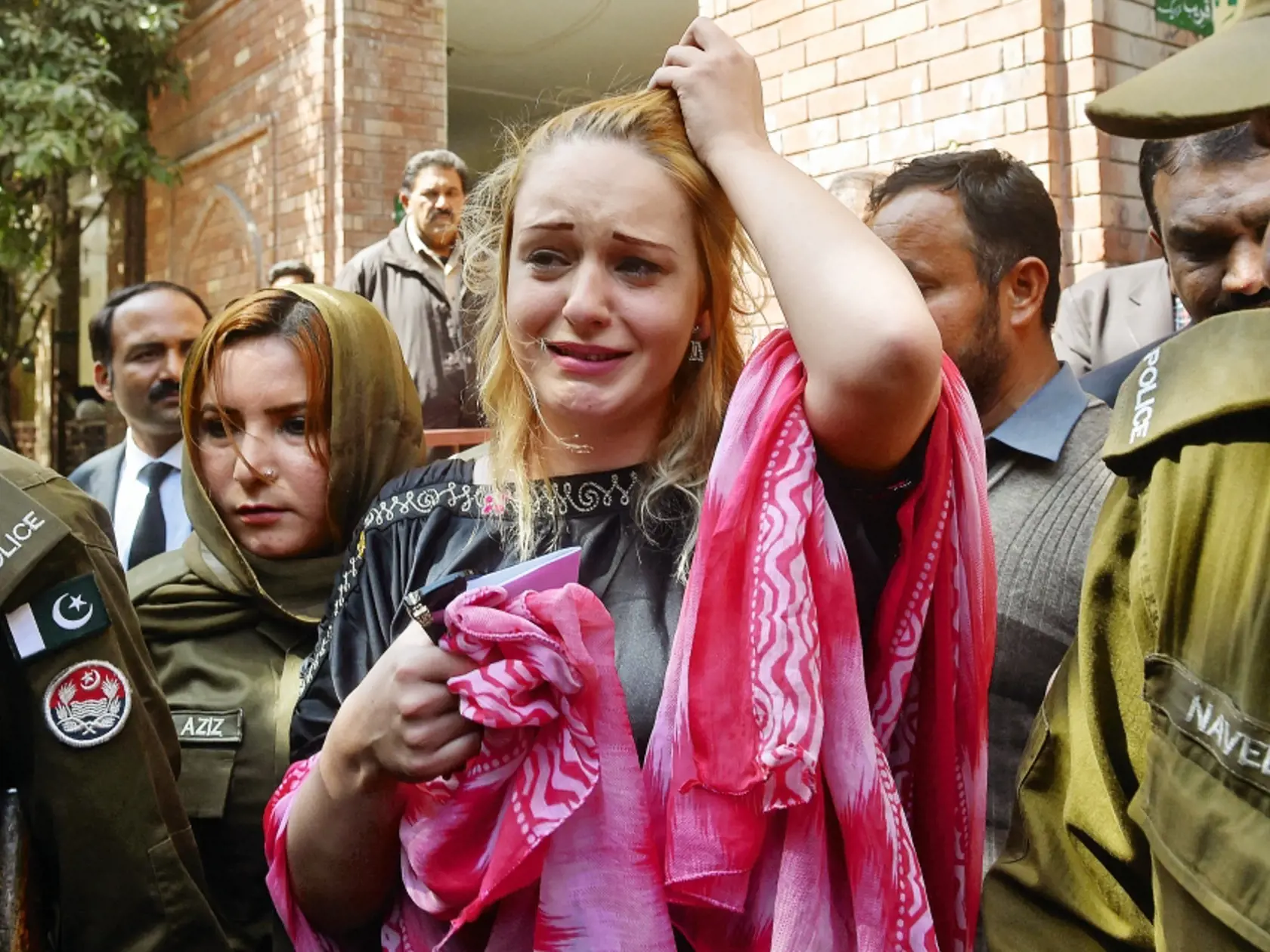 Czech model Tereza Hluskova weeps after the court decision to sentence her to eight years and eight months in prison for attempted heroin smuggling, in Lahore on March 20, 2019.  A Pakistan court sentenced Czech national Tereza Hluskova to eight years and eight months in prison after she was found carrying eight and a half kilogrammes of heroin last year from Lahore’s Allama Iqbal International Airport., Image: 420737530, License: Rights-managed, Restrictions: , Model Release: no, Credit line: P