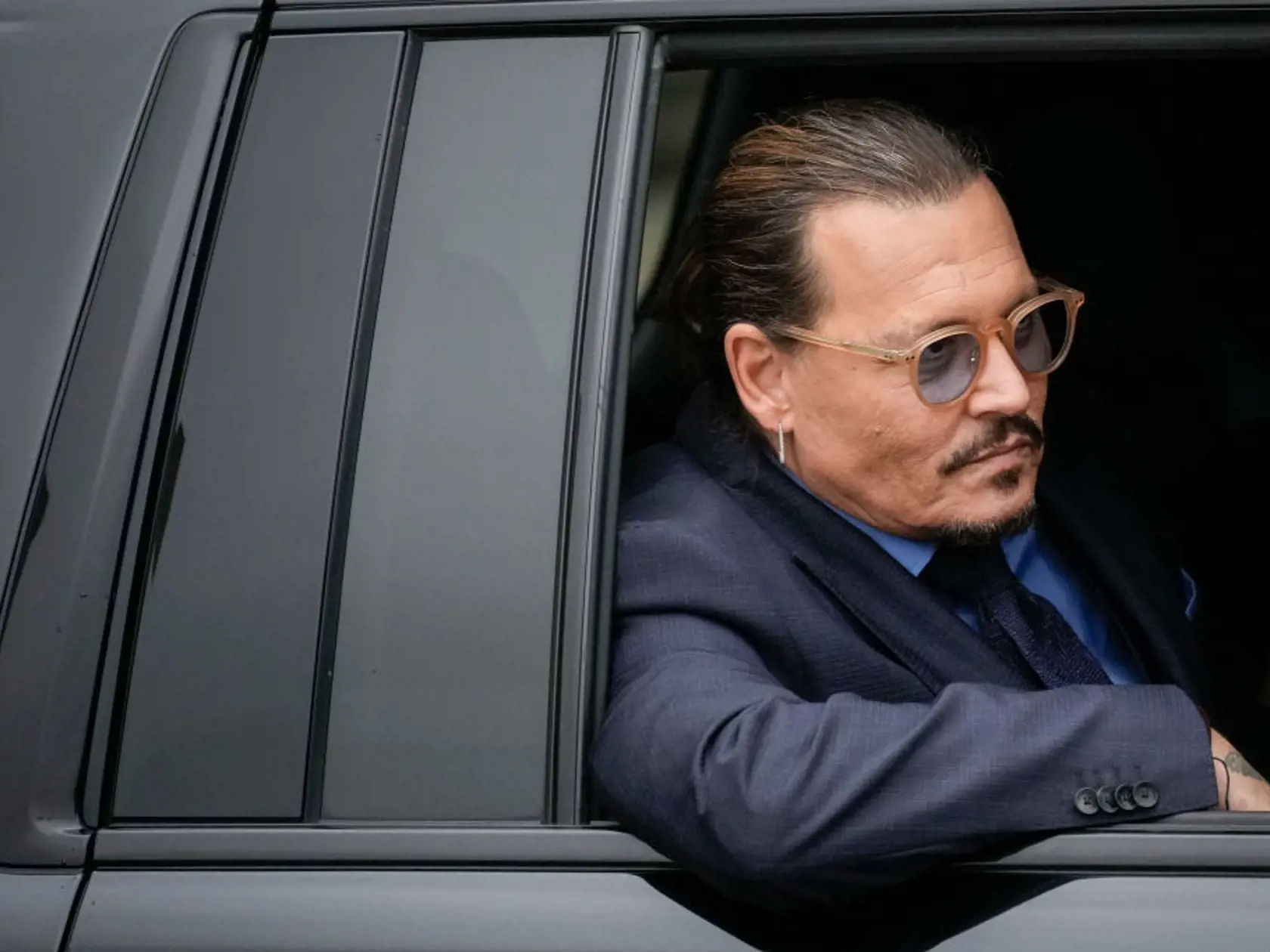 Americký herec Johnny Depp vyhral súd so svojou bývalou manželkou Amber Heardovou