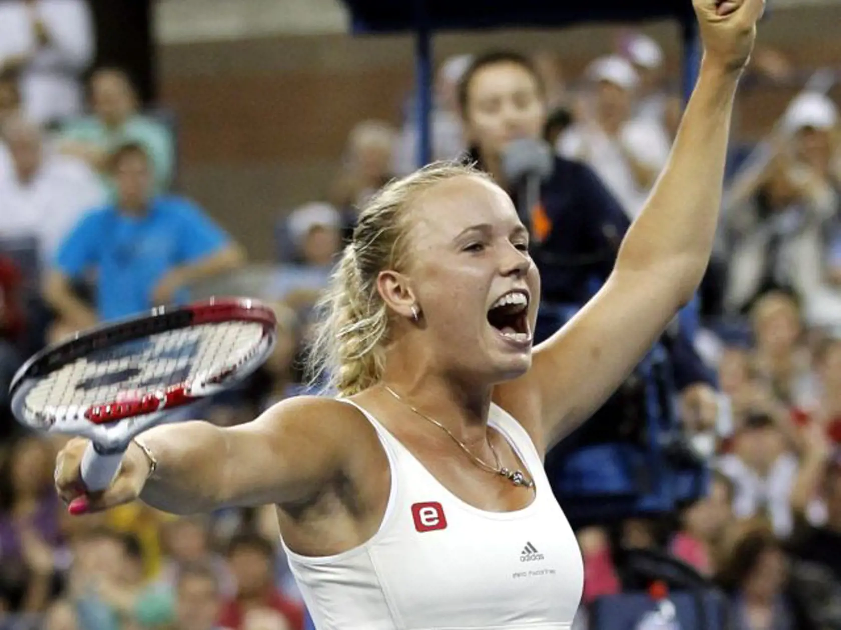 Caroline Wozniacki, of Denmark, reacts after defeating Svetlana Kuznetsova, of Russia, in the fourth round of the U.S. Open tennis tournament, Monday, Sept. 5, 2011, in New York. (AP Photo/Elise Amendola)