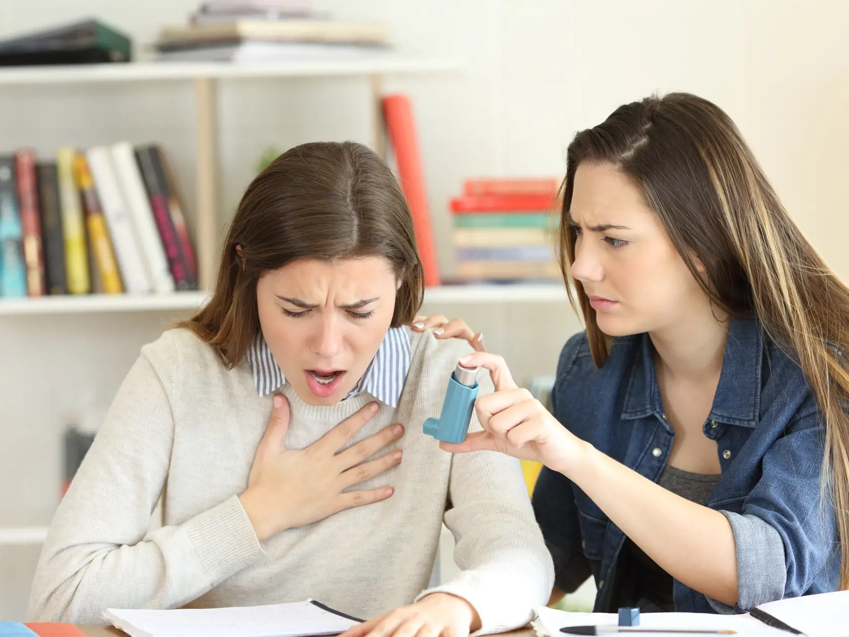 Student,Helping,To,Her,Asmathic,Friend,Giving,The,Inhaler,During