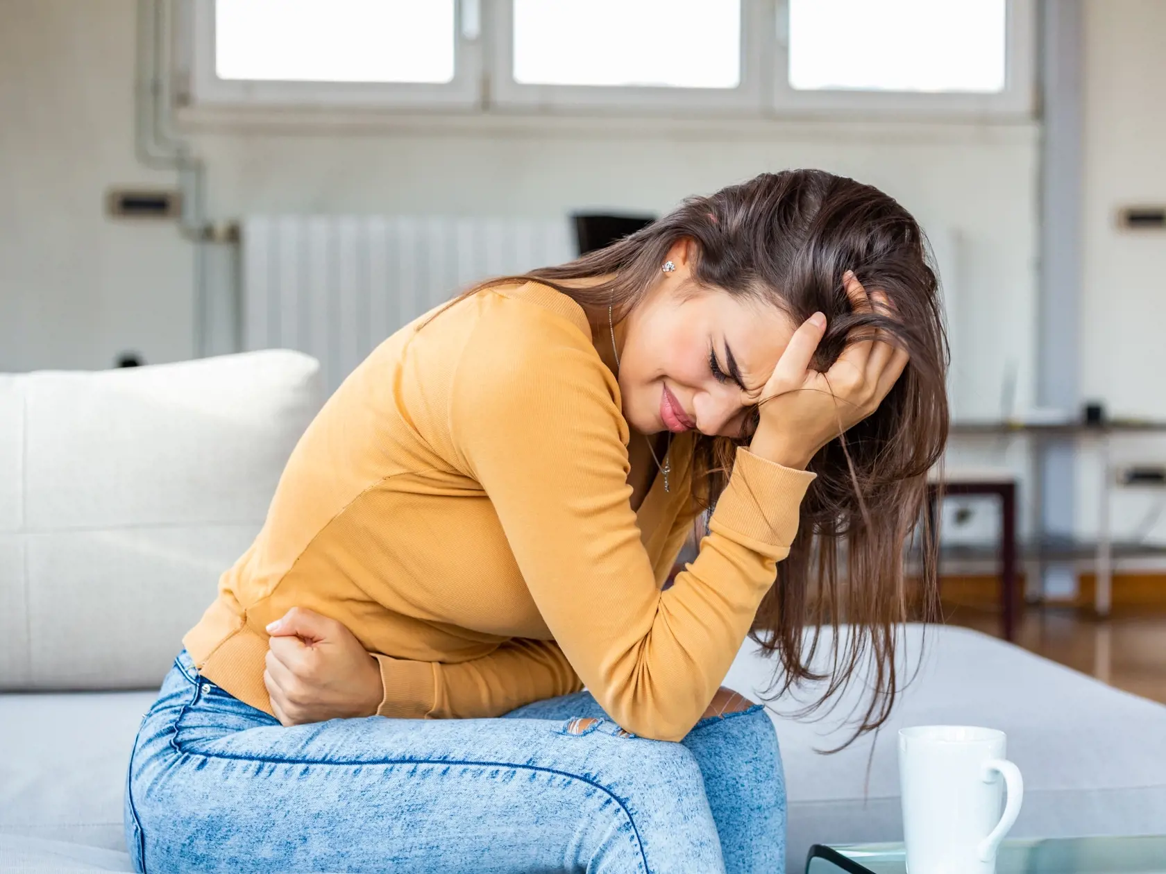 Young,Sick,Woman,With,Hands,Holding,Pressing,Her,Crotch,Lower