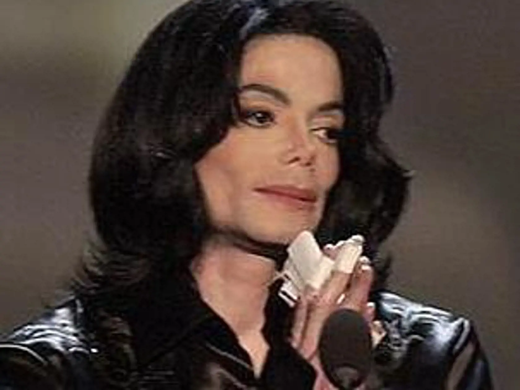 ** FILE ** Michael Jackson thanks the audience during the Radio Music Awards  in this Oct. 27, 2003 filephoto at the Aladdin Hotel in Las Vegas. Investigators armed with a search warrant swarmed Michael Jackson's Neverland Ranch on Tuesday, Nov.18, 2003 a sheriff's official said. The purpose of the search was not disclosed. (AP Photo/Joe Cavaretta, File)