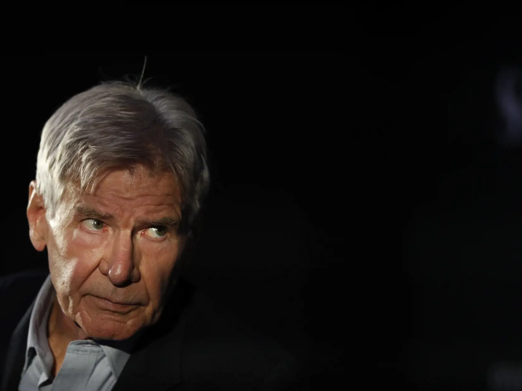 Na snímke americký herec Harrison Ford počúva otázky novinárov počas promovania filmu Volanie divočiny (The Call of the Wild) v Mexiko City 5. februára 2020. FOTO TASR/AP