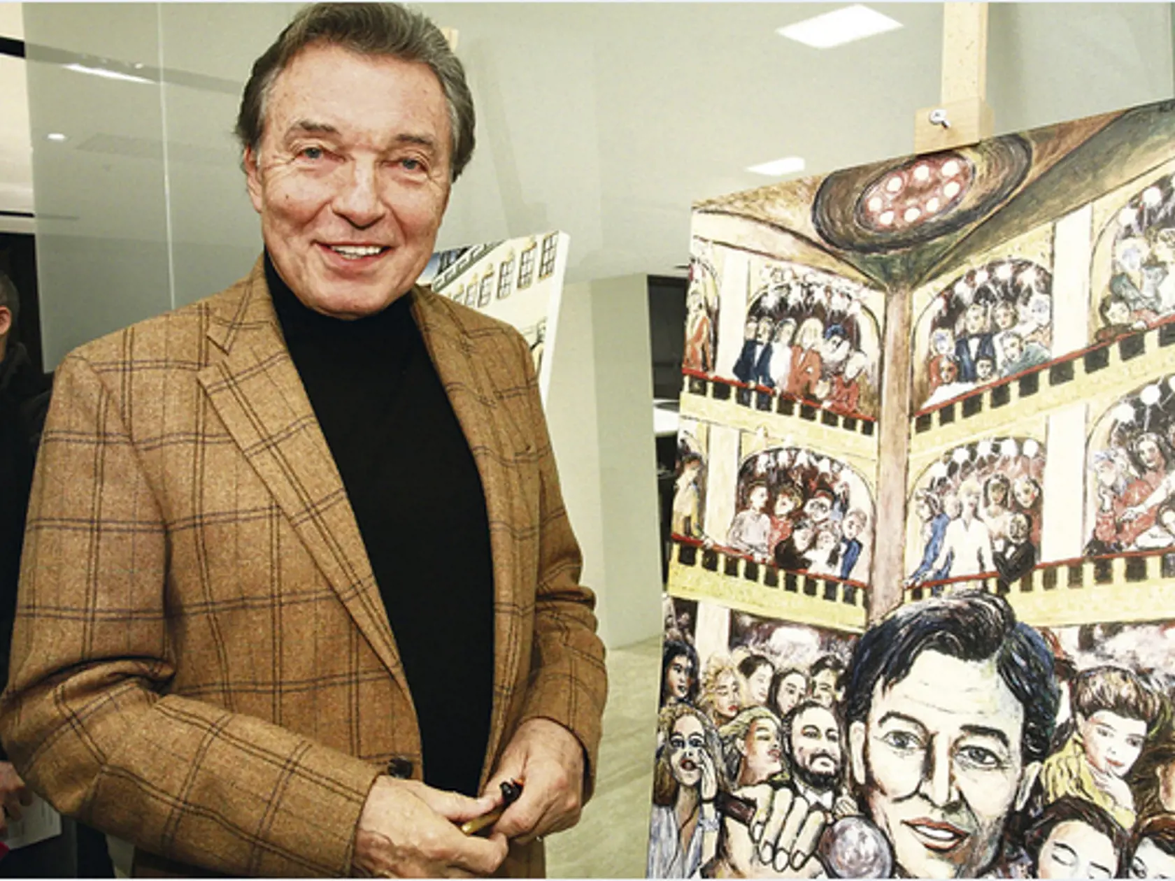 Karel Gott s obrazom, ktorý namaľoval v roku 1989.