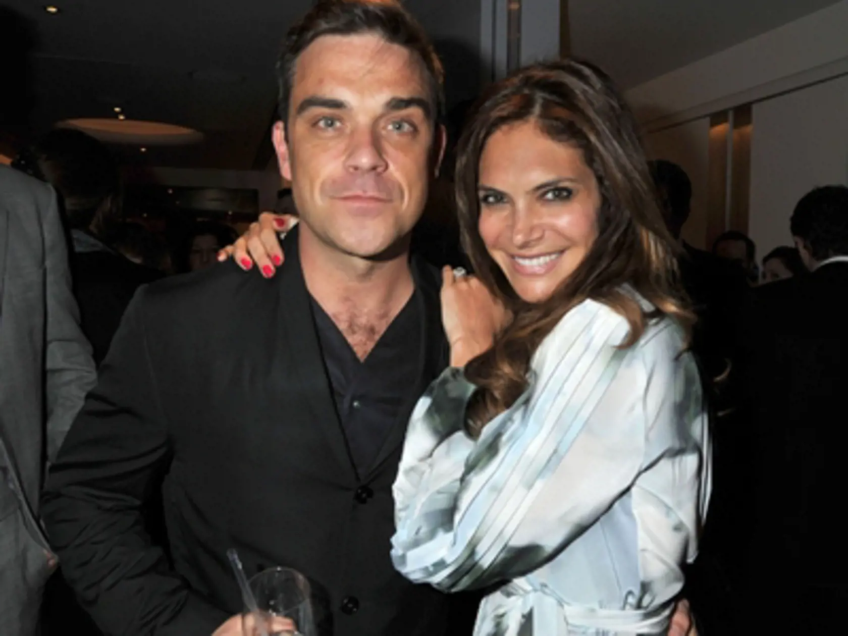Robbie Williams s manželkou Aydou Field.