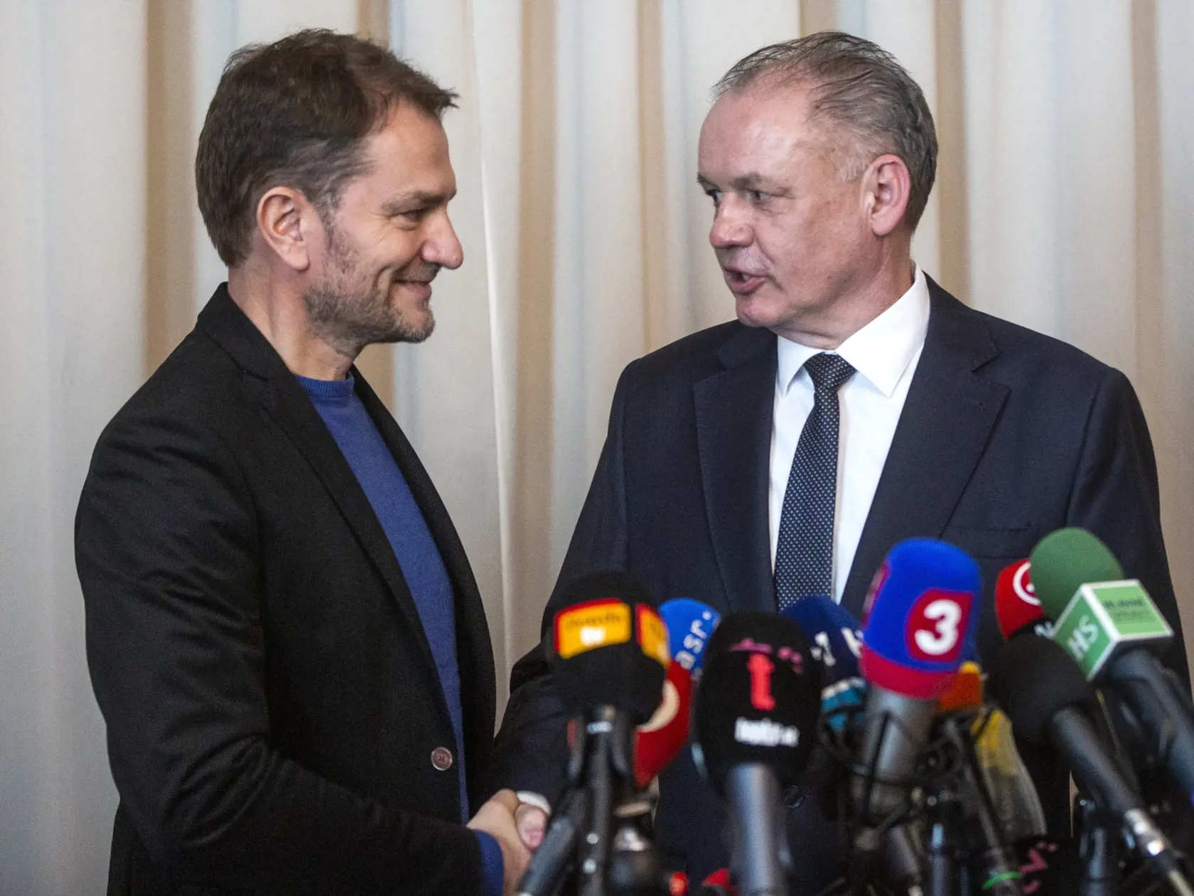 Na snímke zľava líder hnutia OĽaNO Igor Matovič a predseda strany Za ľudí Andrej Kiska počas tlačovej konferencie po spoločnom stretnutí k výsledkom volieb do NR SR v Bratislave 3. marca 2020.