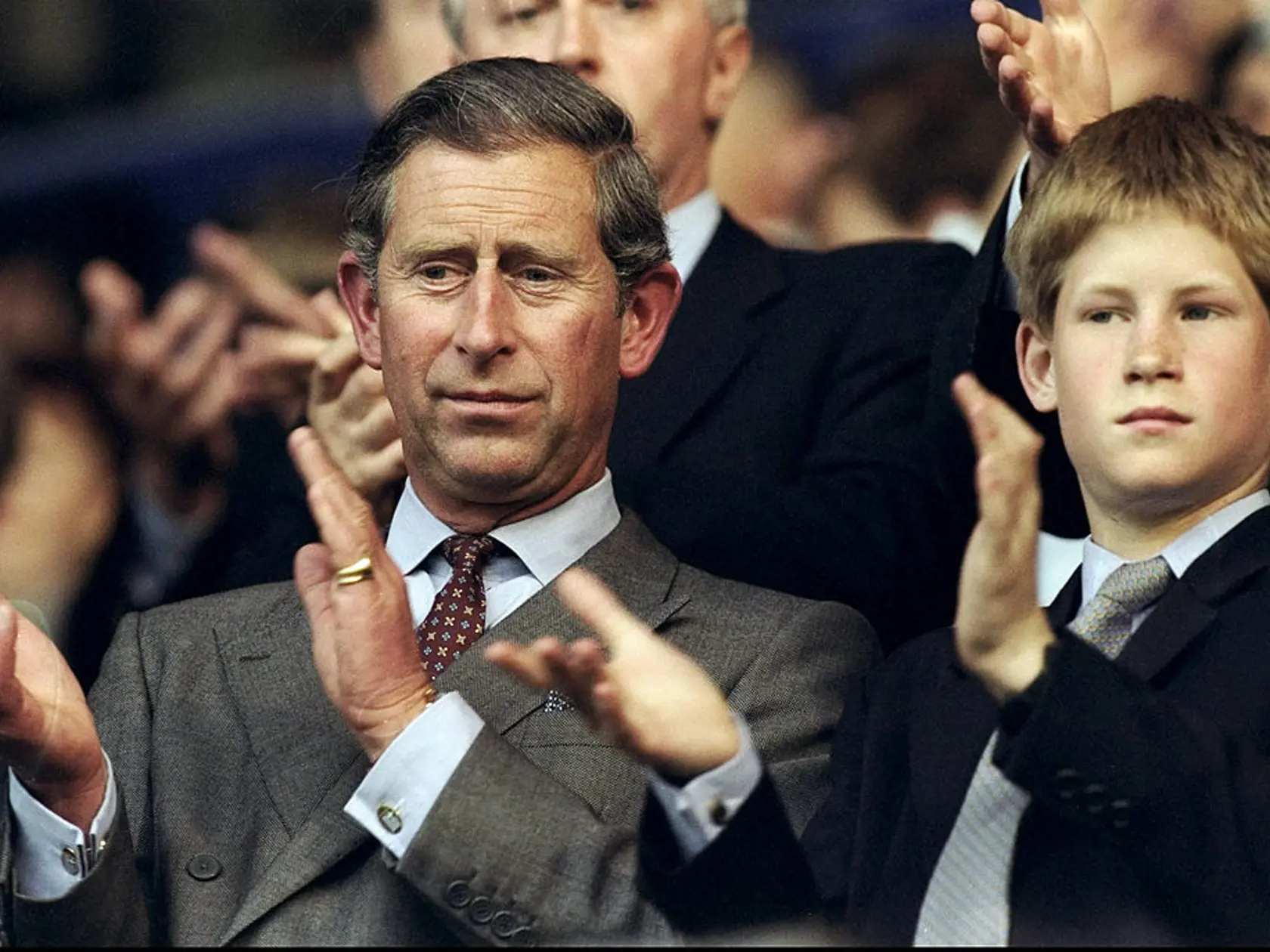 26 Jun 1998:  Prince Charles and Prince Harry show their support during the World Cup group G game between England and Colombia at the Stade Felix Bollaert in Lens, France. England won 2-0 to qualify for the knockout phase. \ Mandatory Credit: Clive Brunskill /Allsport