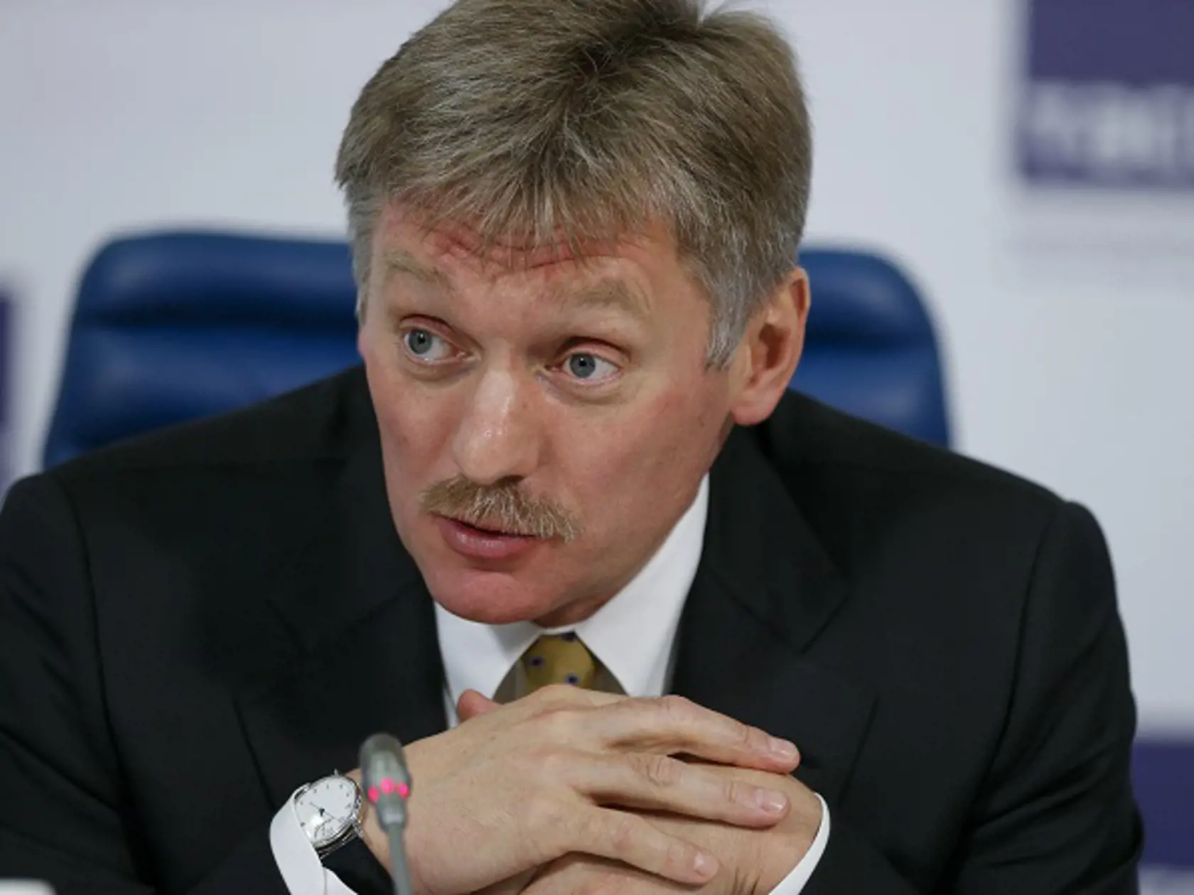 Russian President Vladimir Putin's press secretary Dmitry Peskova speaks at a round table to mark President Vladimir Putin’s 15 years in office, some of the president’s long-term allies questioned his political course and warned of economic fallout in Moscow, Russia, Tuesday, March 31, 2015. Putin was first elected president on March 26, 2000, and has ruled Russian ever since despite a stint as a prime minister which helped him to avoid constitutional limitations.(AP Photo/Alexander Zemlianichen