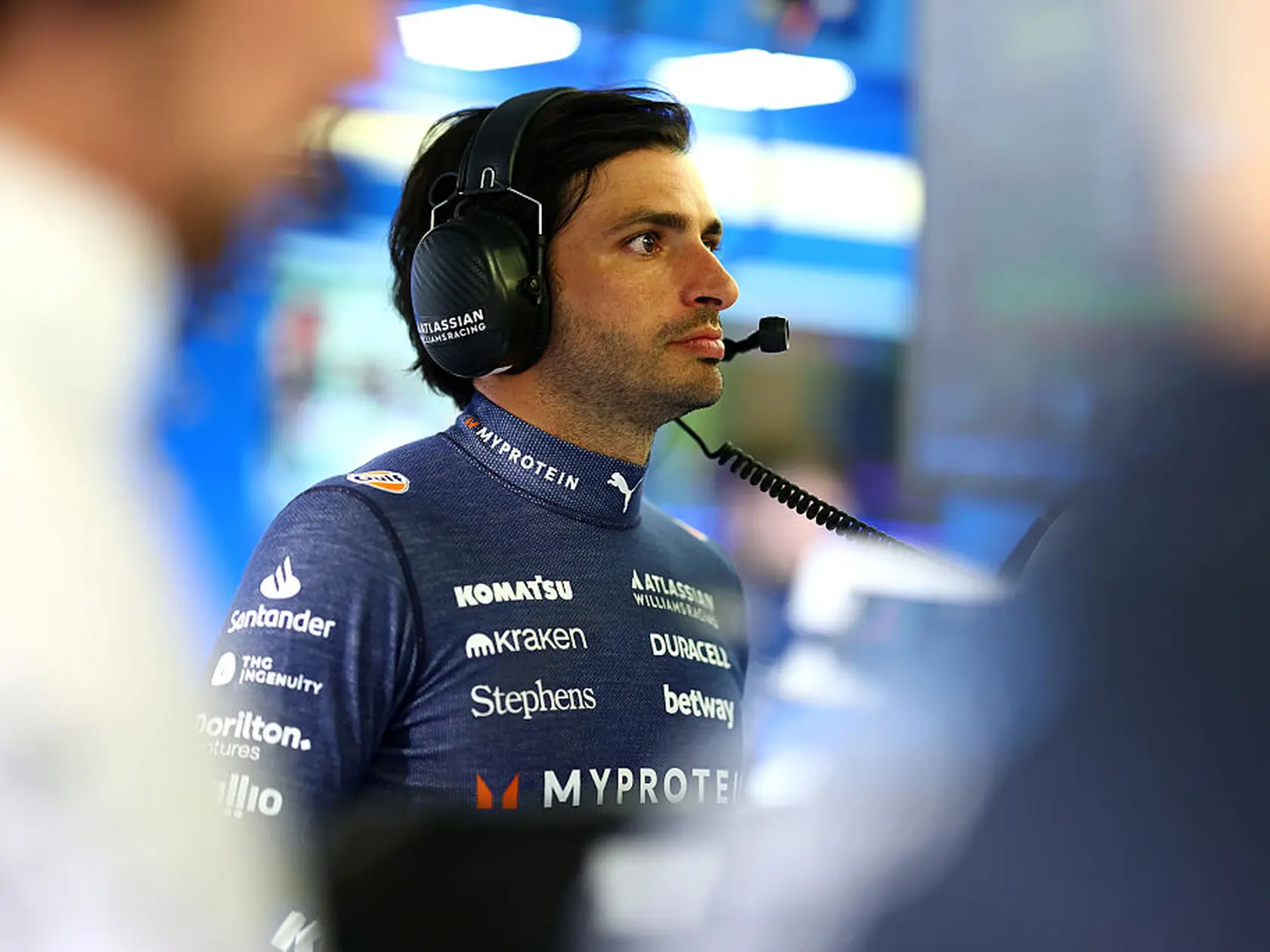 BAHRAIN, BAHRAIN - APRIL 11: Carlos Sainz of Spain and Williams looks on in the garage during practice ahead of the F1 Grand Prix of Bahrain at Bahrain International Circuit on April 11, 2025 in Bahrain, Bahrain. (Photo by Clive Rose/Getty Images)