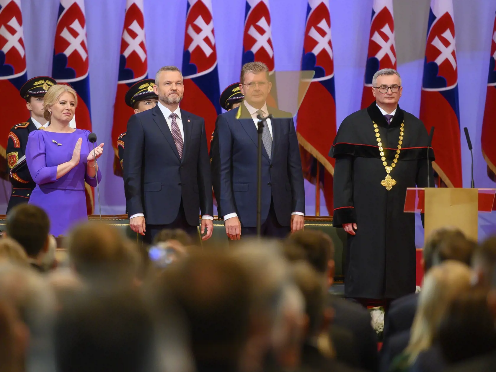 Na snímke druhý vľavo prezident SR Peter Pellegrini, vľavo jeho predchodkyňa Zuzana Čaputová, druhý vpravo podpredseda Národnej rady SR Peter Žiga (Hlas-SD), ktorý je poverený jej vedením, a predseda Ústavného súdu SR Ivan Fiačan po zložení prezidentského sľubu na slávnostnej schôdzi NR SR v budove Slovenskej filharmónie 15. júna 2024 v Bratislave. FOTO TASR - Michal Svítok	