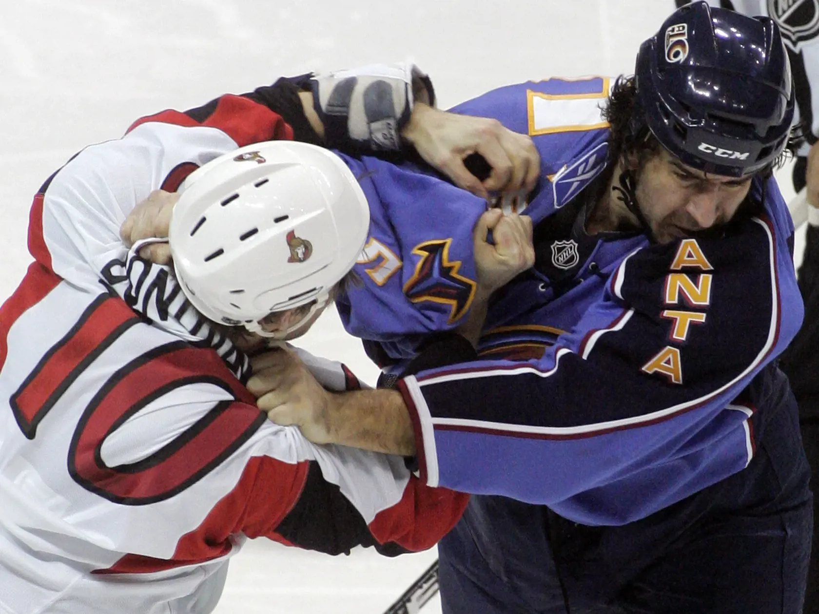 Ottawa Senators right wing Shean Donovan (10) and Atlanta Thrashers defenseman Boris Valabik fight during the first period of an NHL hockey game Tuesday, Jan. 12, 2010, in Atlanta.  (AP Photo/John Amis)