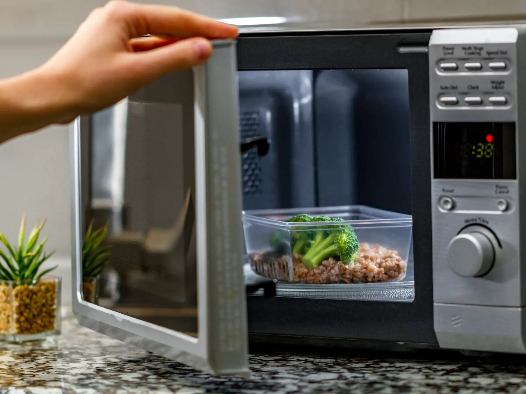 Using,The,Microwave,Oven,To,Heat,Food.,Heating,Plastic,Container