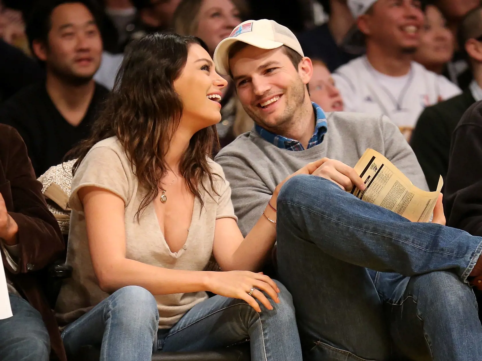 LOS ANGELES, CA - DECEMBER 19:  Actors Ashton Kucher and Mila Kunis attend the game between the Oklahoma City Thunder and the Los Angeles Lakers at Staples Center on December 19, 2014 in Los Angeles, California.  NOTE TO USER: User expressly acknowledges and agrees that, by downloading and or using this photograph, User is consenting to the terms and conditions of the Getty Images License Agreement.  (Photo by Stephen Dunn/Getty Images)