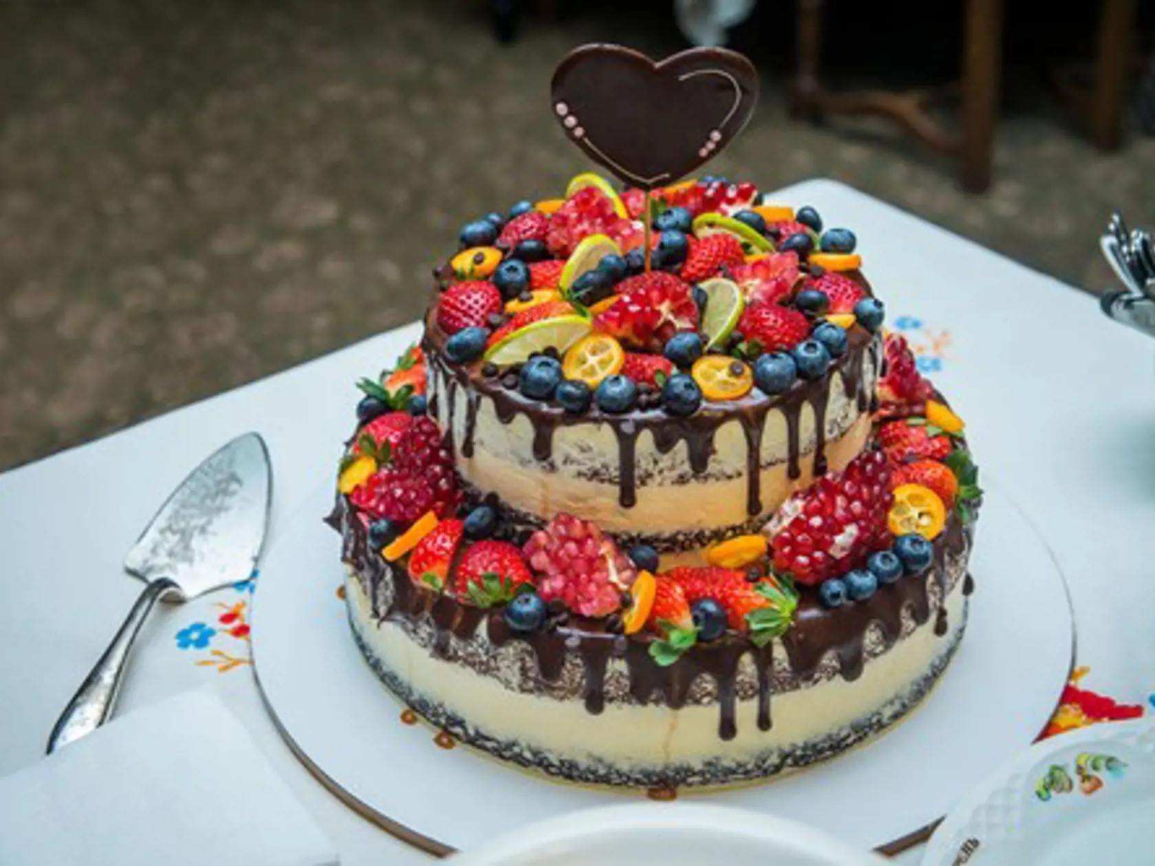 Wedding cake decorated with berries of strawberries, blueberries, pomegranate,, Image: 332110506, License: Royalty-free, Restrictions: , Model Release: no, Credit line: Profimedia, Stock Budget