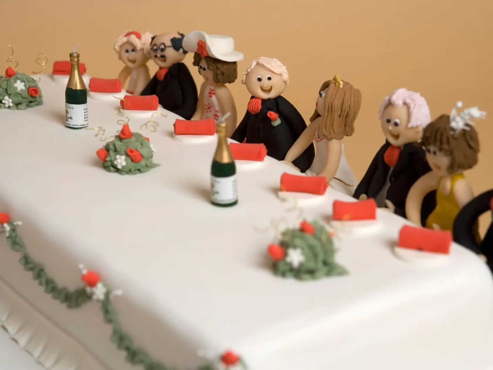 Top Table wedding cake with marzipan figures of main guests and couple., Image: 11254701, License: Rights-managed, Restrictions: , Model Release: no, Credit line: Profimedia, Alamy