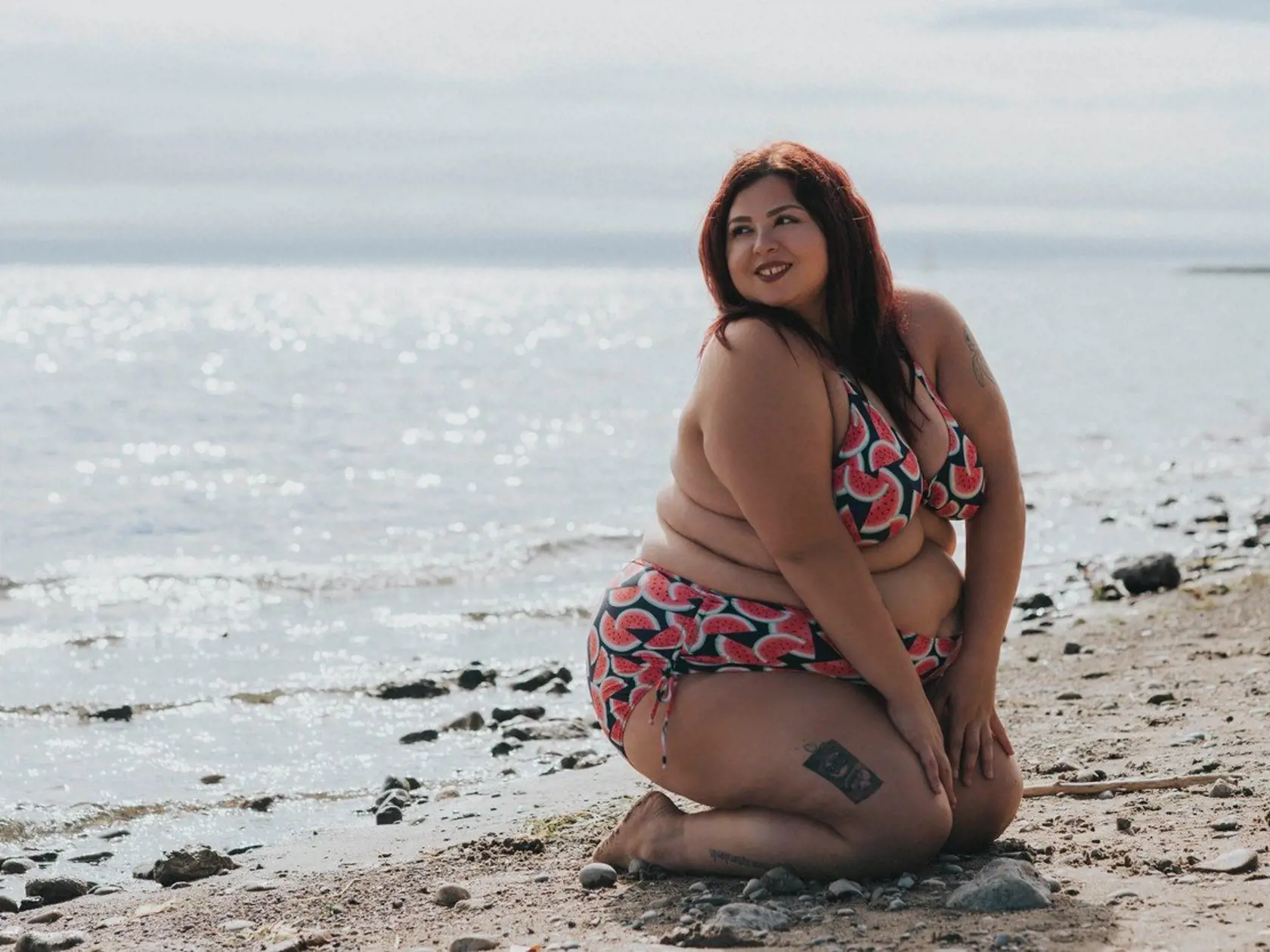 *** EXCLUSIVE - VIDEO AVAILABLE ***    CHERRY BEACH, TORONTO - 9 OCTOBER: Plus Size Body Activist Jewelz Mazzei modelling on the beach in a watermelon bikini, Cherry Beach, Toronto, 9 October 2017.      A PLUS-SIZE Model claims she has '99 problems, but being fat, ain't one.? Julianna Mazzei, AKA Jewelz is confident, humorous and sassy, and has no shame when it comes to posing with little clothing and talking to her thousands of social media followers about ?fat problems.? The 25-year-old from T