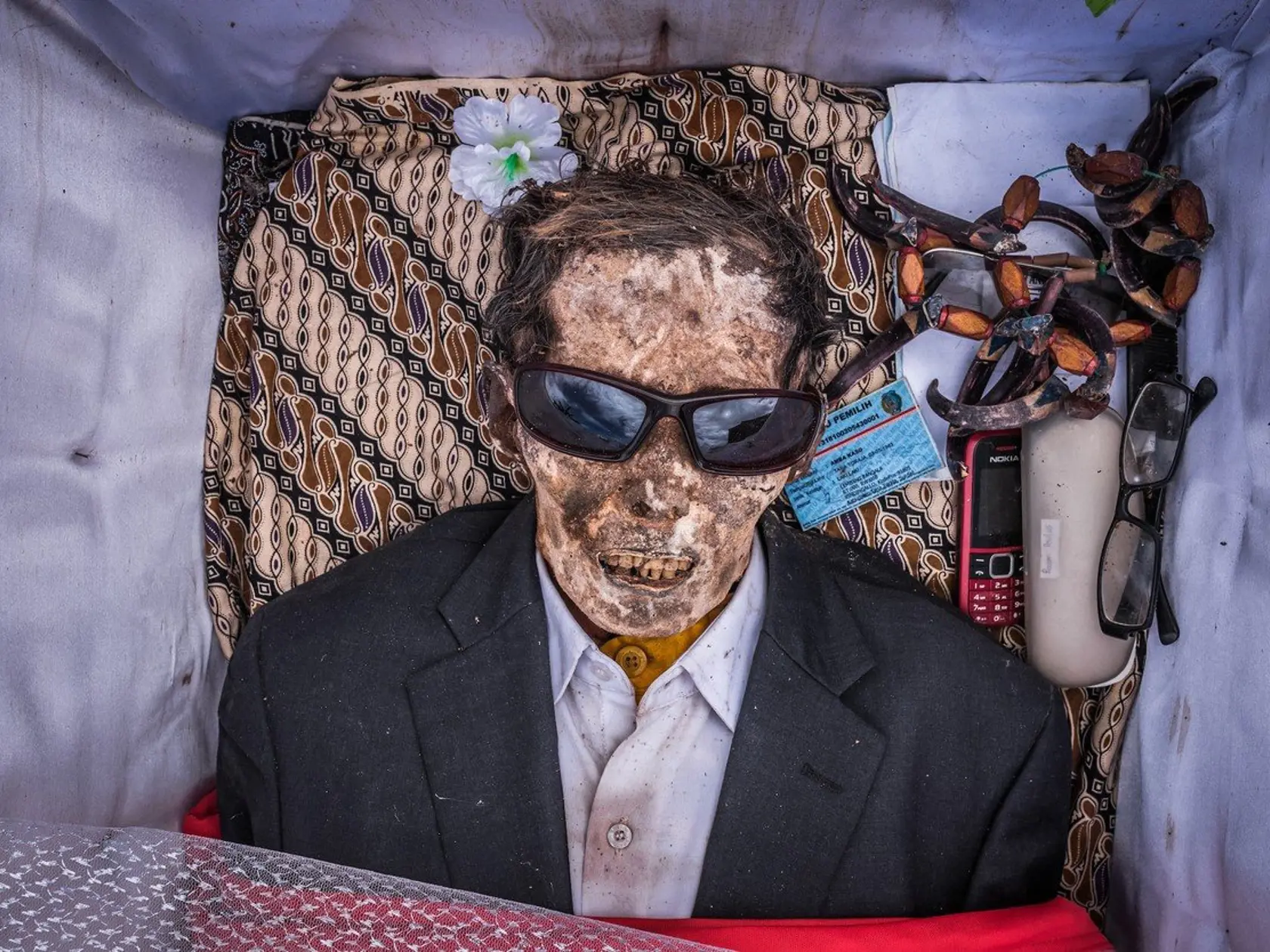*** GETTY OUT ***    CLAUDIO SIEBER tells his story through the lens as he captures these incredible photos with The Toraja People, an ethnic group indigenous to the mountainous region of Tana Toraja.    MA'NENE which translates as THE CEREMONY OF CLEANING OF CORPSE  has been practised for more than a century and takes place in TORJA, SOUTH SULAWESI REGION of INDONESIA.    Funeral ceremonies are incredibly important to the Tarajans and are often held weeks, months, or even years after the death 