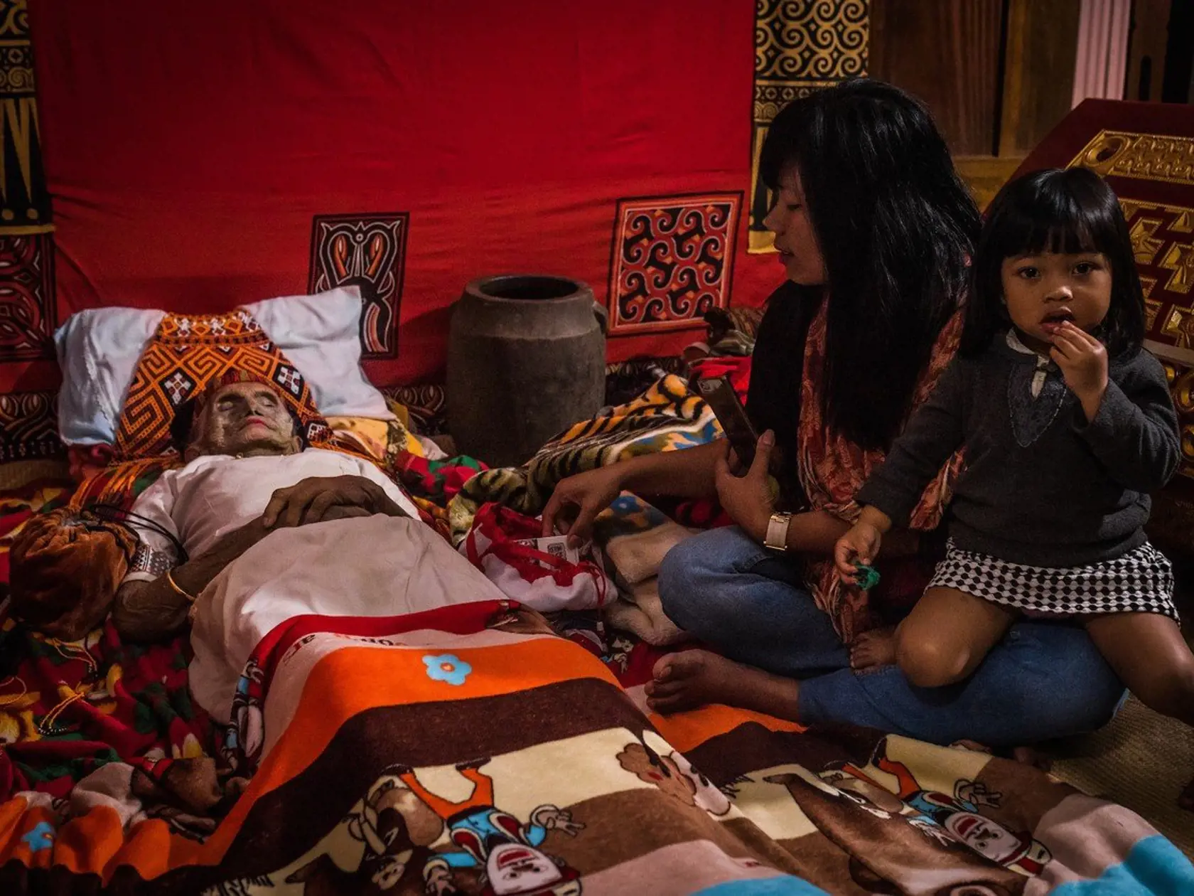 *** GETTY OUT ***    CLAUDIO SIEBER tells his story through the lens as he captures these incredible photos with The Toraja People, an ethnic group indigenous to the mountainous region of Tana Toraja.    MA'NENE which translates as THE CEREMONY OF CLEANING OF CORPSE  has been practised for more than a century and takes place in TORJA, SOUTH SULAWESI REGION of INDONESIA.    Funeral ceremonies are incredibly important to the Tarajans and are often held weeks, months, or even years after the death 
