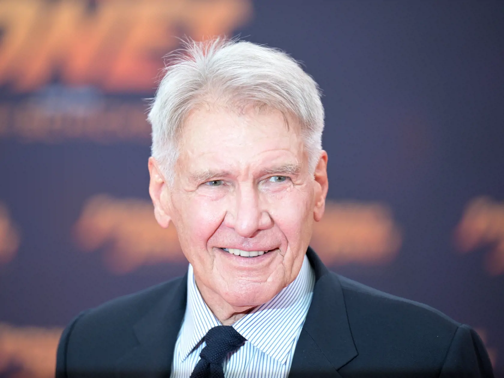 Na archívnej snímke z 22. júna 2023 v Berlíne herec Harrison Ford pózuje počas nemeckej premiéry filmu Indiana Jones a Nástroj osudu. Novoobjavený druh hada v Peru pomenovali Tachymenoides harrisonfordi podľa amerického herca Harrisona Forda. Cieľom bolo prejaviť úctu úsiliu herca v oblasti ochrany životného prostredia. FOTO TASR/DPA