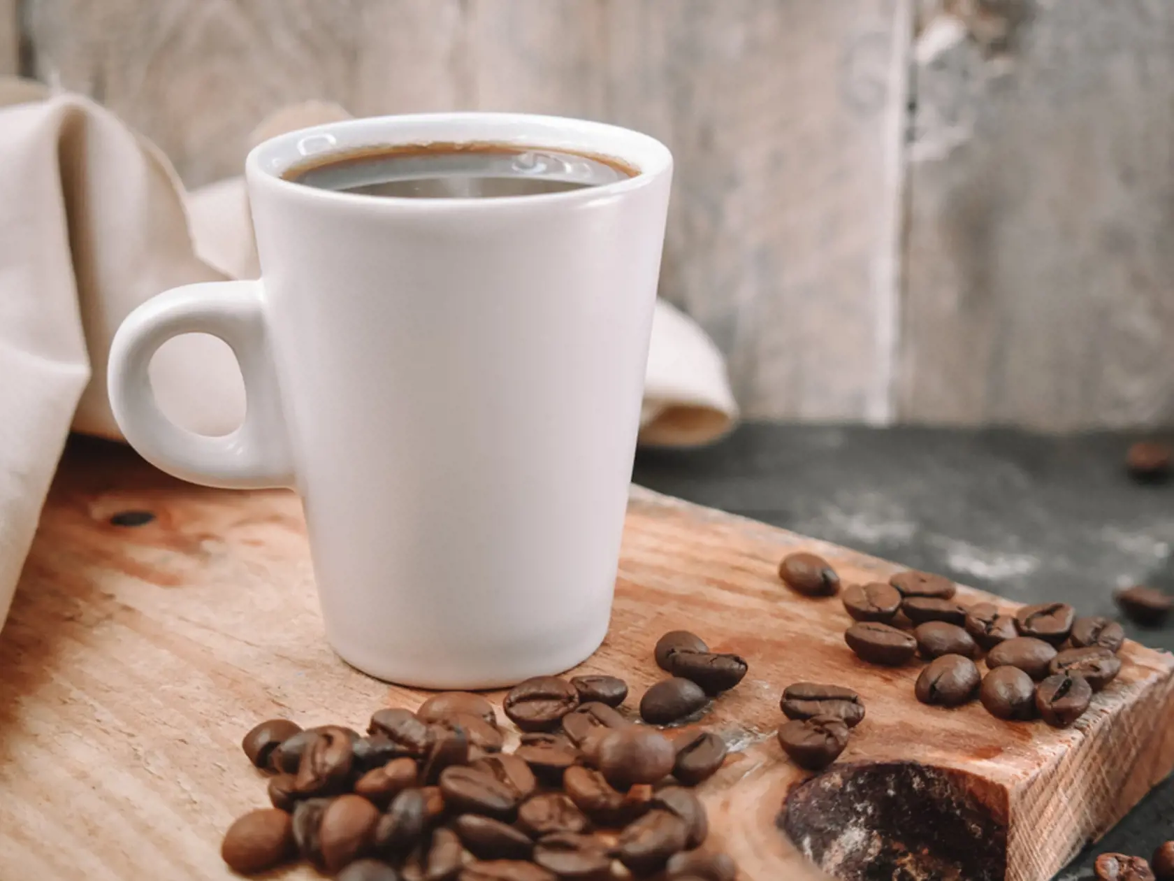 Coffee,Beans,On,Wooden,Close,Up,Photography