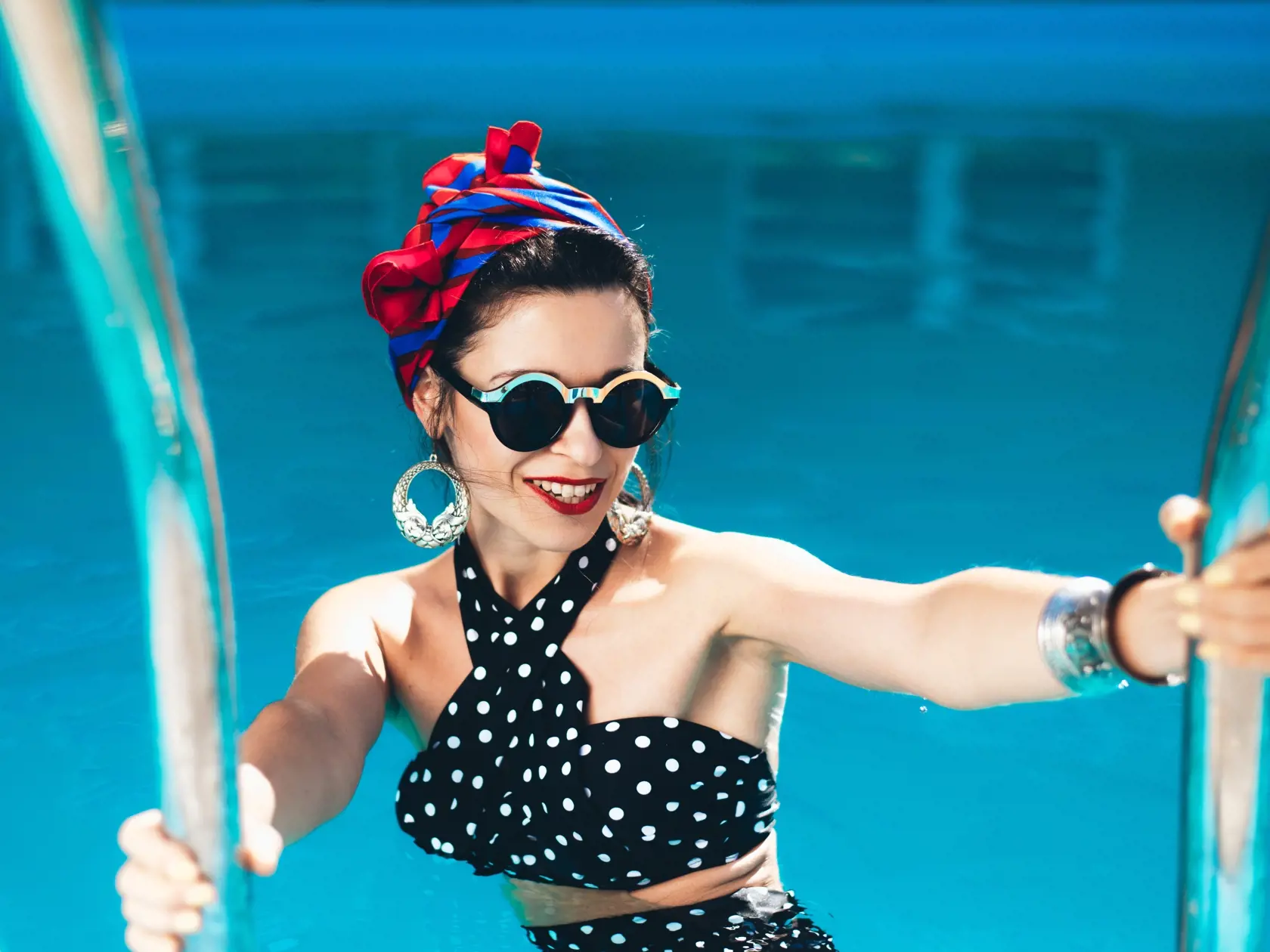 Beautiful,Girl,By,The,Pool,With,Long,Dark,Hair,And