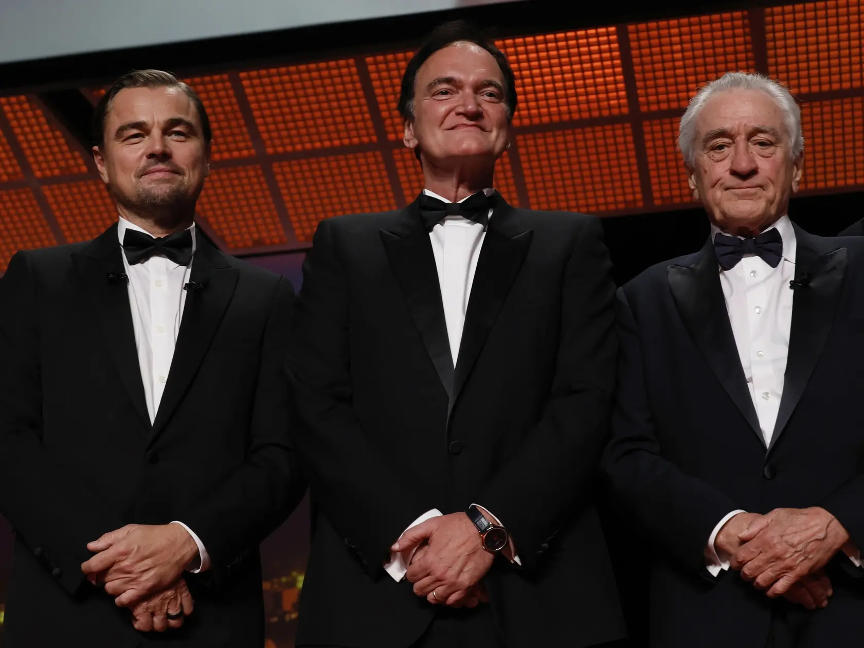 WA 6 Cannes - Na snímke zľava americký herec  Leonardo DiCaprio Robert De Niro (vpravo), americký scenárista a filmový režisér Quentin Tarantino a americký herec Robert De Niro pózujú  počas otváracieho ceremoniálu 78. ročníka Medzinárodného filmového festivalu vo francúzskom letovisku Cannes v utorok 13. mája 2025. De Niro si na otvorení prevzal Zlatú palmu za svoje celoživotné dielo. FOTO TASR/AP 


Leonardo DiCaprio, from left, Quentin Tarantino, and Honorary Palme d'Or recipient Robert De Niro pose for photographers during the opening ceremony of the 78th international film festival, Cannes, southern France, Tuesday, May 13, 2025. (Photo by Joel C Ryan/Invision/AP)