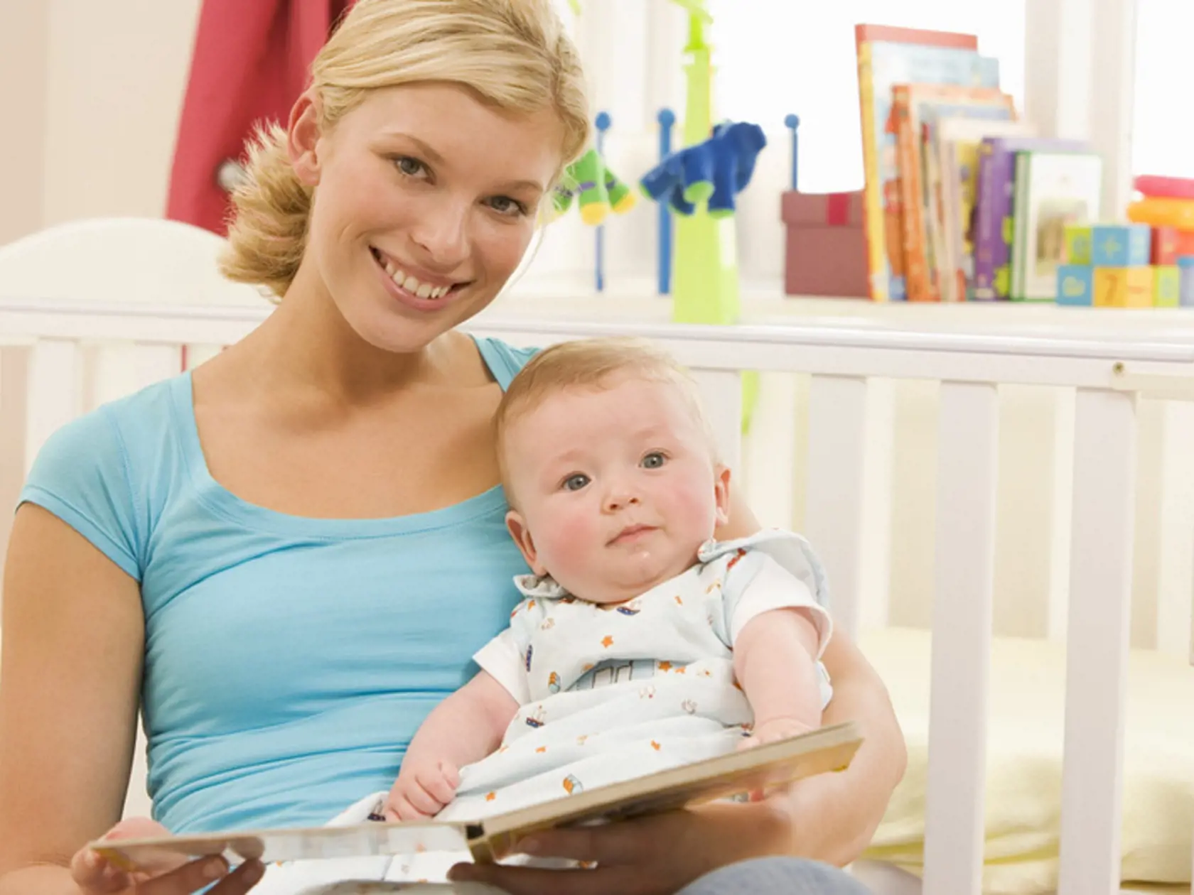 Mother reading to baby