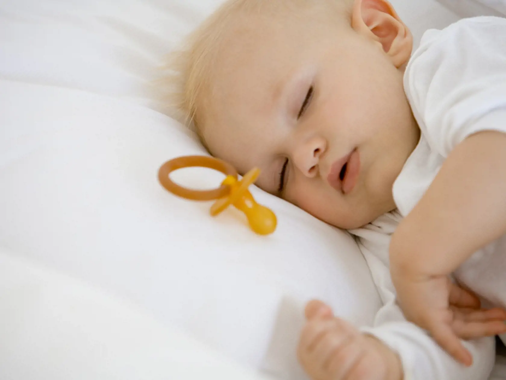 Sleeping baby with pacifier