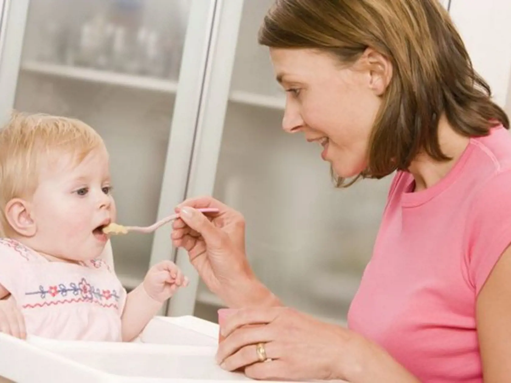 Mother feeding baby
