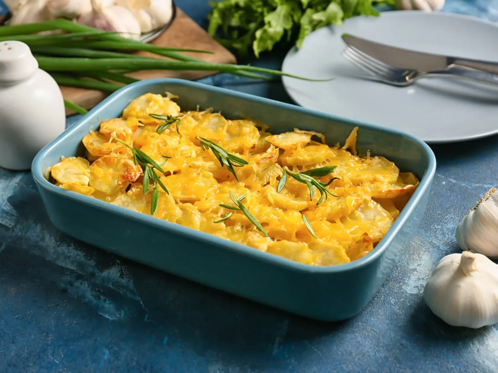 Baking,Dish,Of,Tasty,Potato,With,Cheese,And,Garlic,On