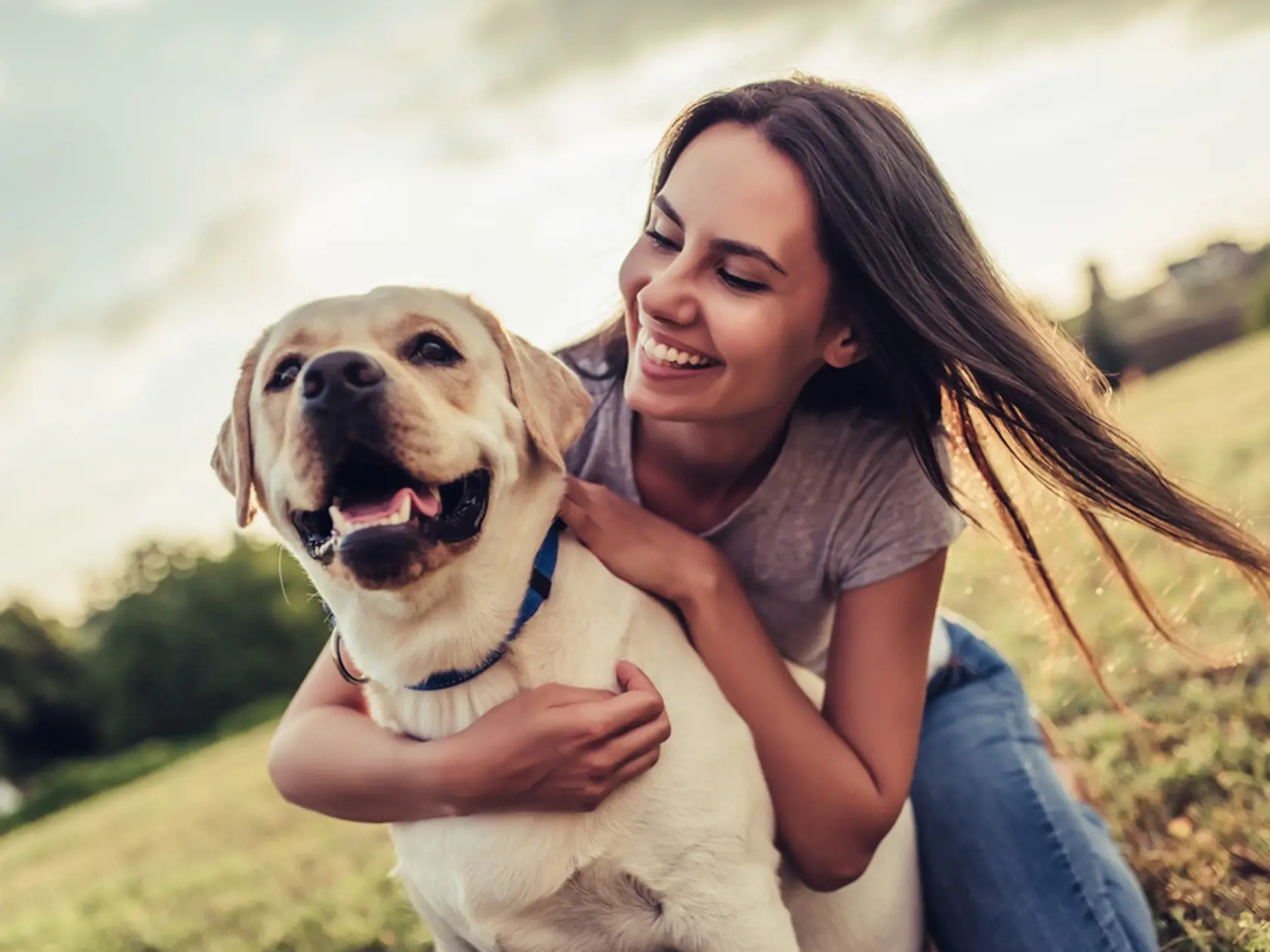 Attractive,Young,Woman,With,Labrador,Outdoors.,Woman,On,A,Green