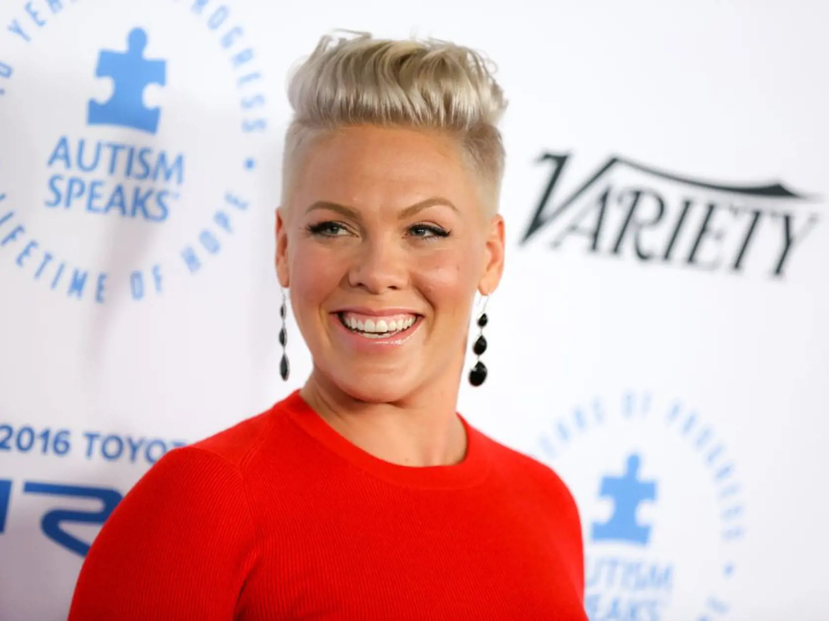 FILE - In this Oct. 8, 2015, file photo, Pink arrives at the Autism Speaks to LA Celebrity Chef Gala in Santa Monica, Calif. Pink, whose given name is Alecia Moore, was named a UNICEF Ambassador on Monday, Nov. 30, to help promote a new effort to encourage physical activity in young children in the United States and at the same time raise money for nutritional, vitamin-rich peanut paste to be delivered to hungry children all over the world. (Photo by Rich Fury/Invision/AP, File)