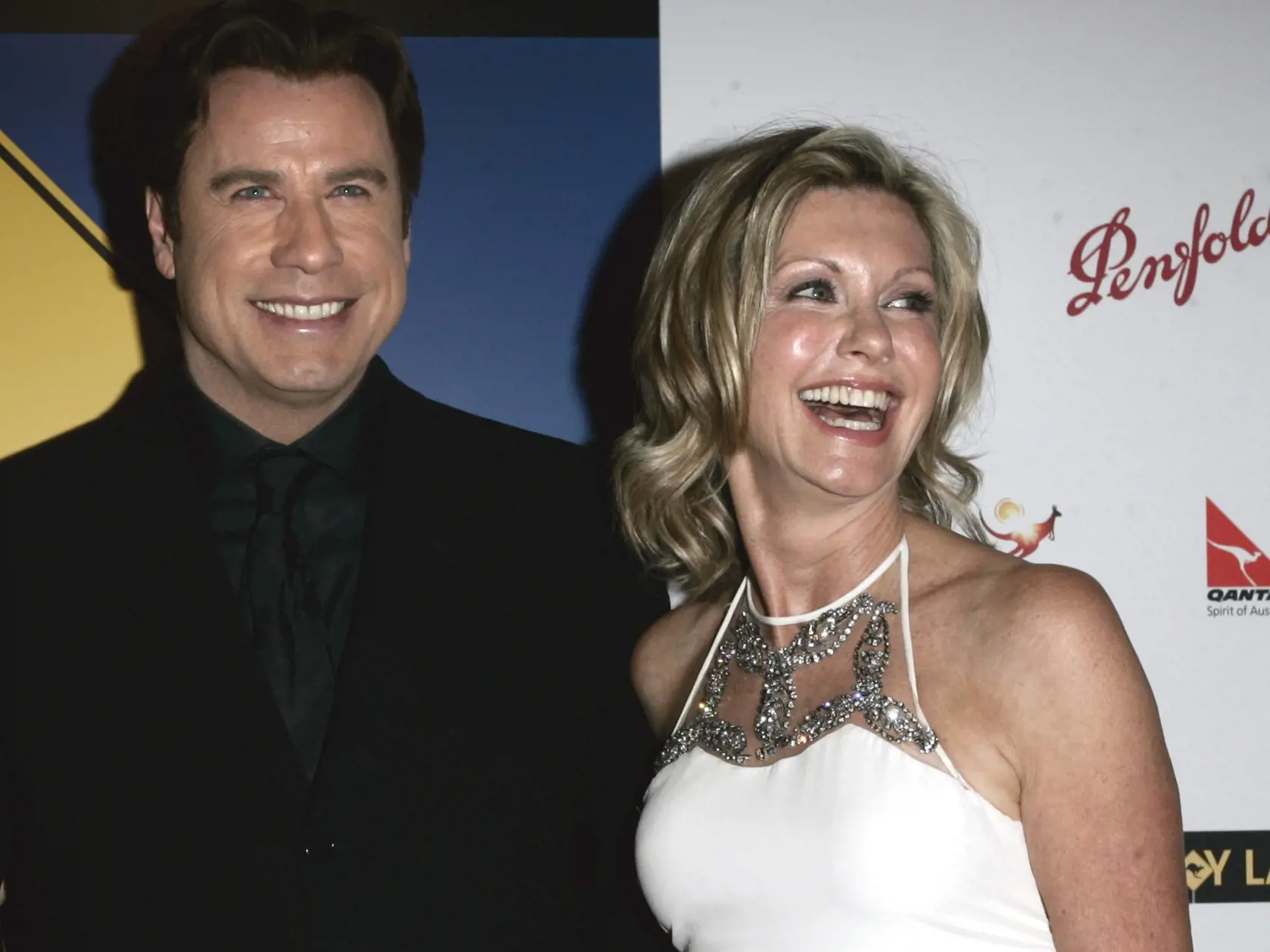 WA 50 archív Los Angeles - Na archívnej snímke zo 14. ajnuára 2006 austrálska speváčka a herečka Olivia Newton-John a americký herec John Travolta pózujú v Los Angeles. Olivia Newton-John zomrela vo veku 73 rokov na svojom ranči v Južnej Kalifornii v pondelok 8. augusta 2022. Celosvetovo sa preslávila rolou Sandy vo filmovom muzikále Pomáda, kde si zahrala po boku Johna Travoltu. Herečka prehrala 30-ročný boj s rakovinou prsníka, informoval stanicu BBC jej agent. FOTO TASR/AP  

FILE - John Trav