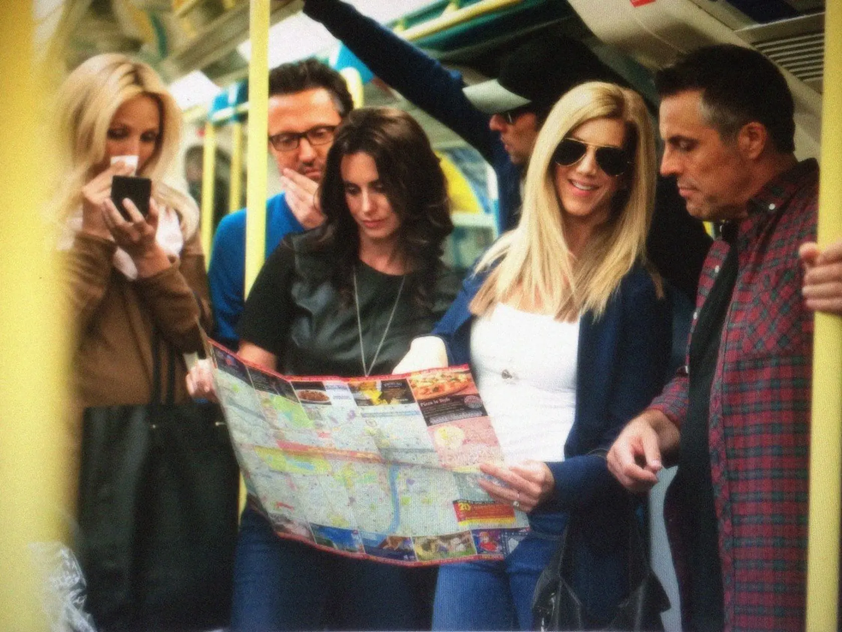Mandatory Credit: Photo by Alison Jackson/REX (4102057a)  Friends cast lookalikes looking at a tube map  'Friends' cast lookalikes in London, Britain - Sep 2014  20 years after the show first started Friends fans can rejoice as the entire cast has reunited. Proving that they were good pals both on and off-screen Jennifer Aniston, Courtney Cox, Lisa Kudrow, Matt LeBlanc, David Schwimmer and Matthew Perry have all been spotted out and about together in London. However, a closer look reveals the se