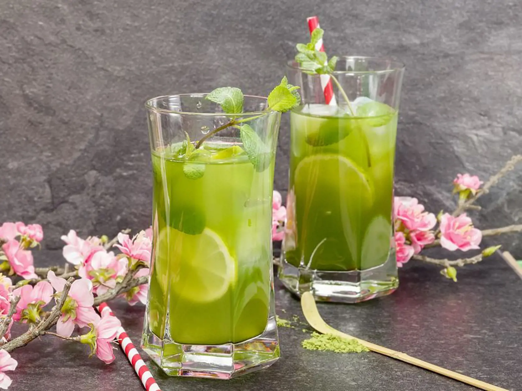 Healthy Iced Matcha Tea with lime, ginger and mint. Macro, selective focus