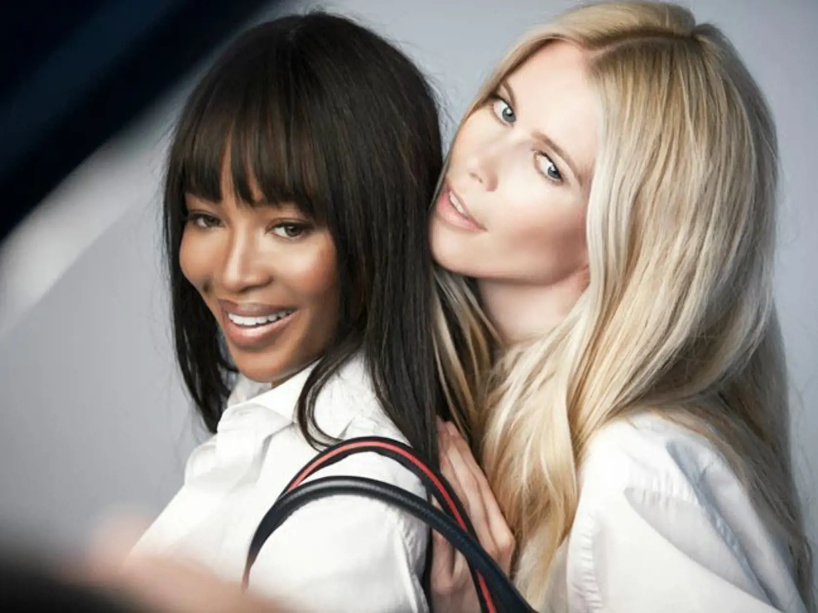 October 2013-Supermodels Naomi Campbell & Claudia Schiffer team up to support fight against cancer cause by posing for Tommy Hilfiger for Breast Health International campaign featuring the specially designed handbag. In charge of the photography was the legendary Patrick Demarhcelier., Image: 173980977, License: Rights-managed, Restrictions: WORLDWIDE RIGHTS, Model Release: no, Credit line: Profimedia, Crystal pictures