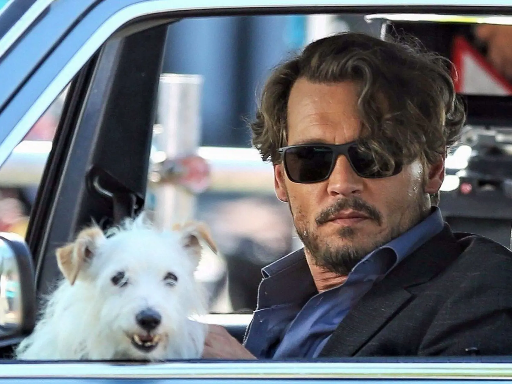 Vancouver, CANADA  - *EXCLUSIVE*  - Johnny Deep filmed a driving scene with a cute puppy for the movie 'Richard Says Goodbye.' The film follows the story of  a world weary college professor â€” portrayed by Depp â€” who is given a life-changing diagnosis and decides to throw all pretense and conventions to the wind and live his life as boldly and freely as possible with a biting sense of humor, a reckless streak and a touch of madness. Shot on 08/14/17    Pictured: Johnny Depp    BACKGRID USA 15