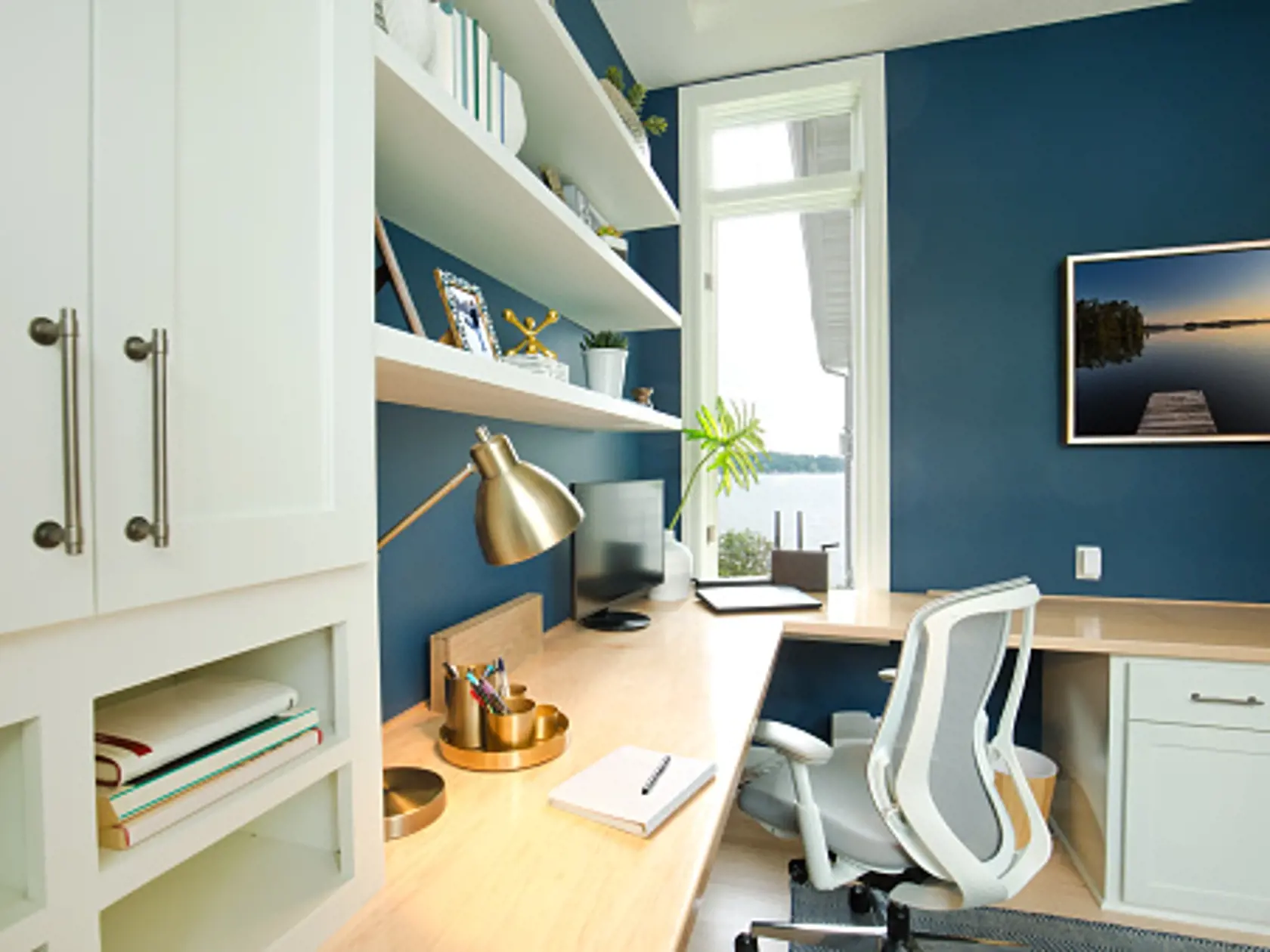 +++NOTE TO INSPECTOR+++ All photo artwork on wall and on shelf are photo taken by me and is currently in iStock collection.

A modern cozy office interior design with computer desk and office chair.