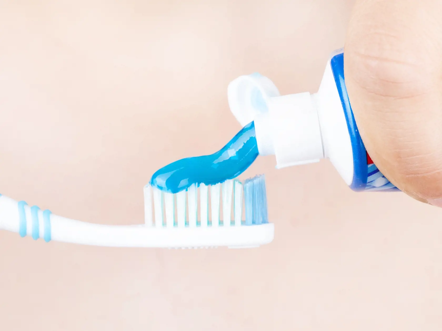 Toothpaste,Is,Applied,To,The,Toothbrush,concept:,Tooth,Brushing,.
